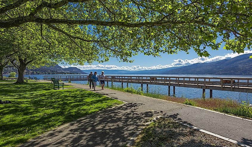People walking in the summer park, Peachland, British Columbia.