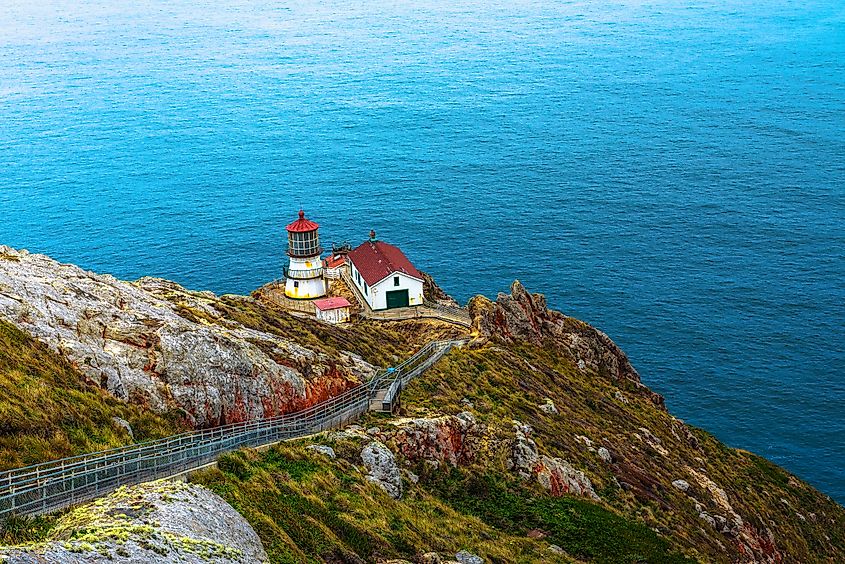 Point Reyes Lighthouse, perched on a rugged cliff at the Point Reyes National Seashore in California.