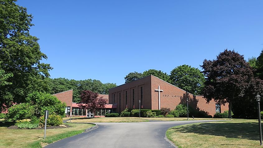 Holy Martyrs Church in Falmouth, Maine, with its modern brick exterior and tall, narrow windows