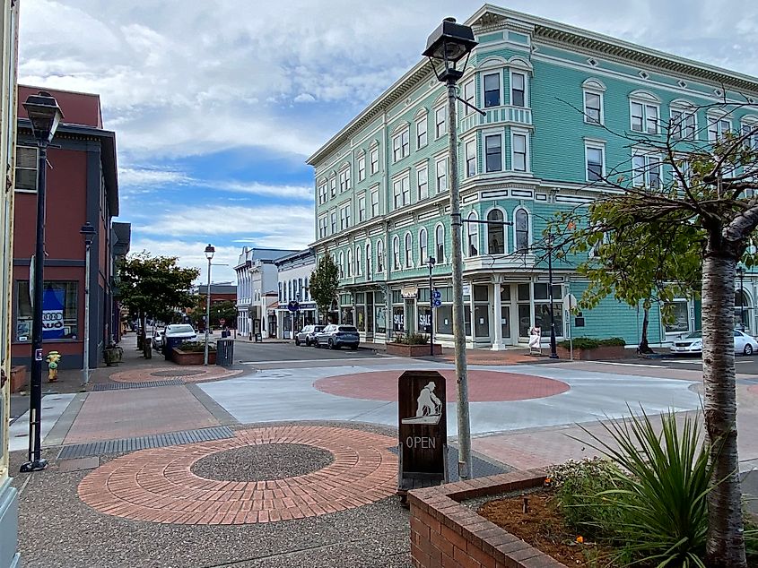 Eureka, CA's Victorian Old Town, with colorful buildings and intricate brick sidewalks.