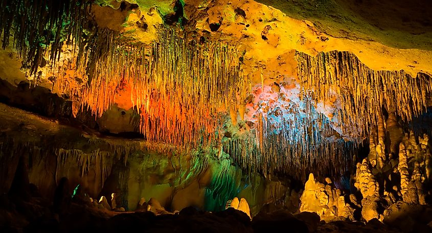 Colored lights illuminate the cave formations at Florida Caverns State Park.