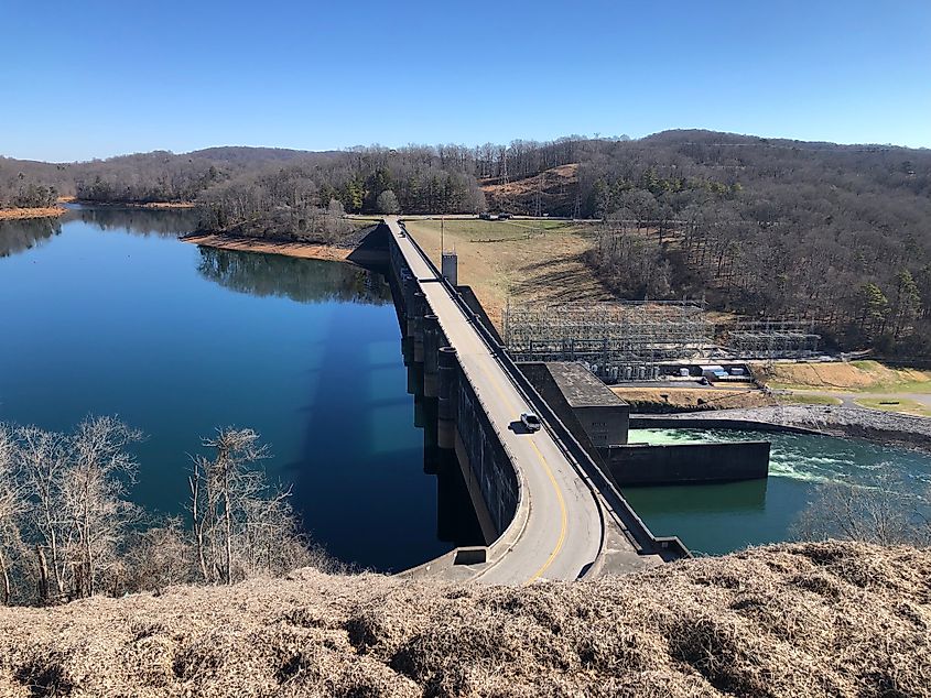 Car driving over Norris Dam.