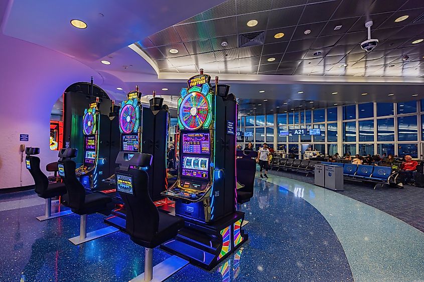 Interior view of the waiting room with gambling machine in Harry Reid International Airport