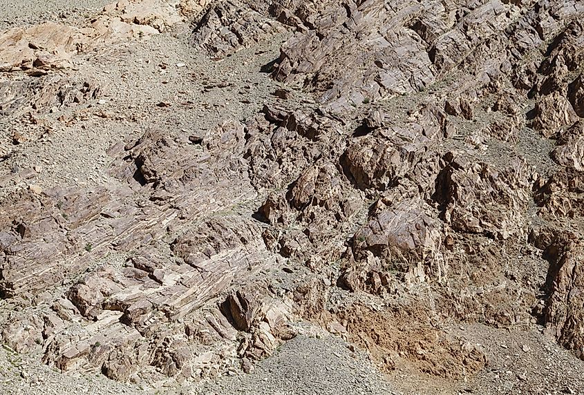 An ophiolite outcrop of old oceanic crust exposed on land.