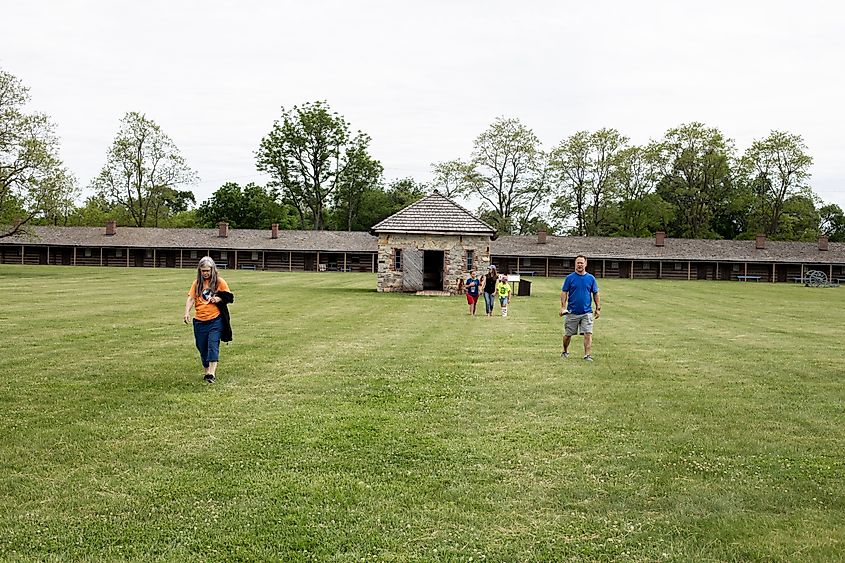 A group of people walking around Fort Atkinson Historical State Park in Fort Calhoun, Nebraska