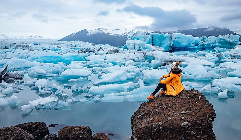 Woman next to Jökulsárlón Lake in Iceland