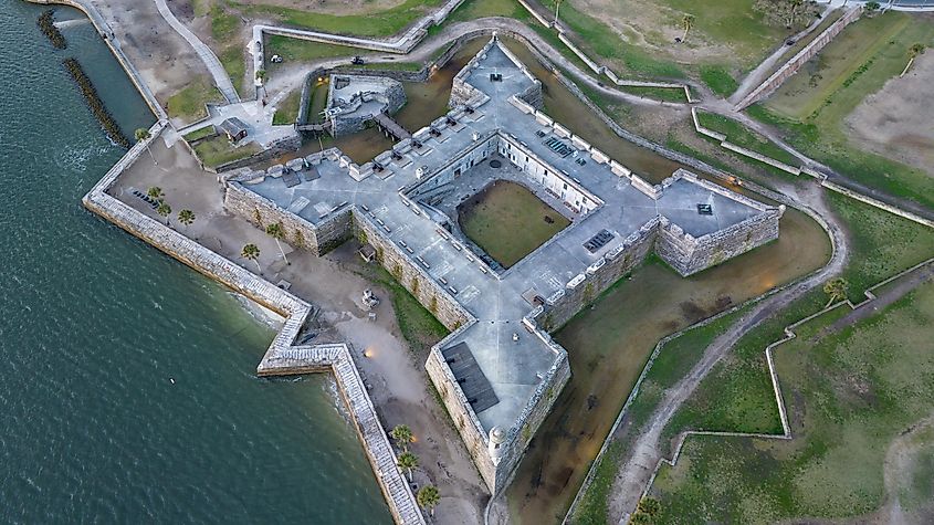 Aerial shot of the Castillo de San Marcos National Monument during sunrise.