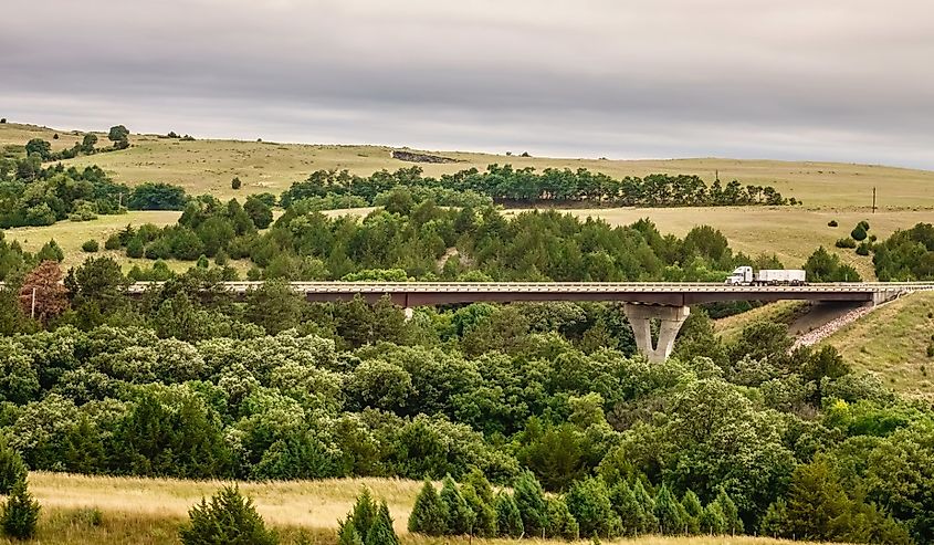 Semi-trailer truck crossing bridge along Nebraska Highway 12, also known as Outlaw Trail Scenic Byway, outside Valentine, Nebraska