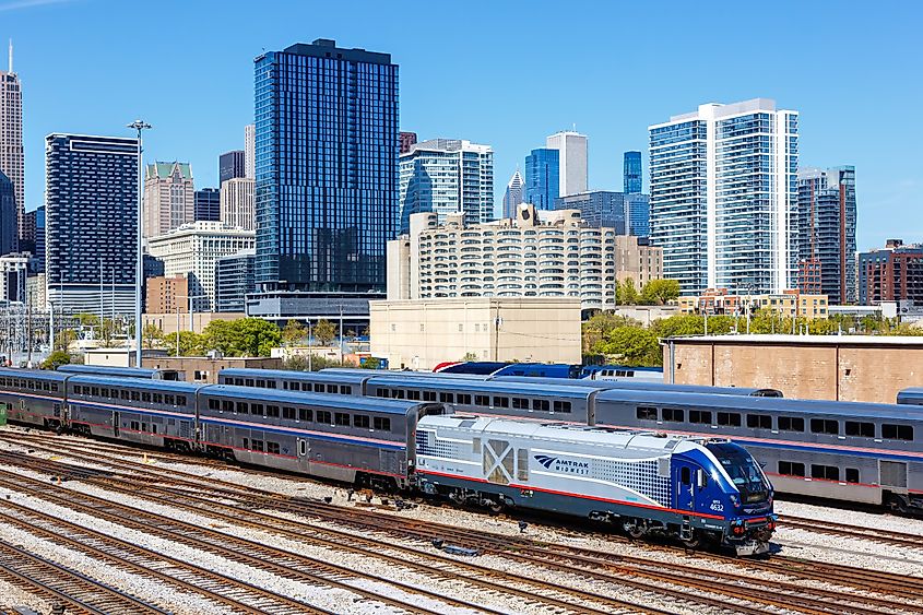 Chicago skyline with an Amtrak Midwest passenger train passing near Union Station