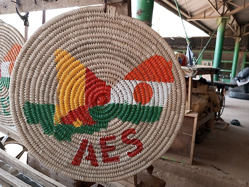An artisan-made mat with an AES logo.