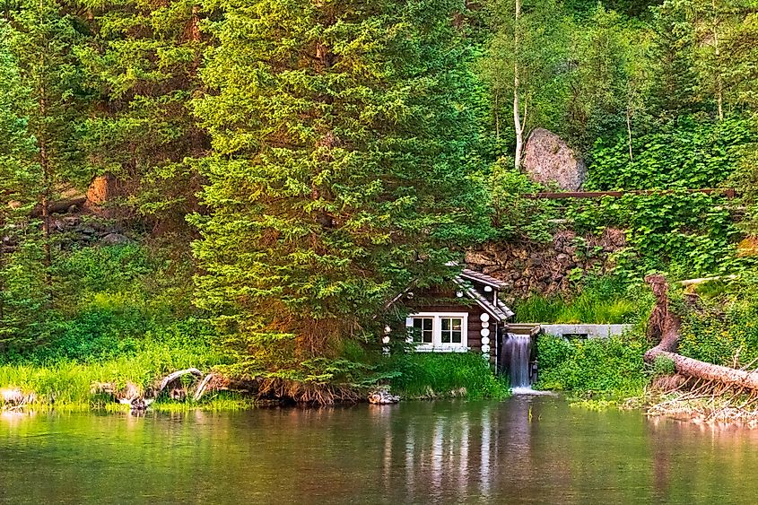 Water wheel at Johnny Sack Cabin near Big Springs, Island Park, Idaho. Image Credit T.Schofield via shutterstock.