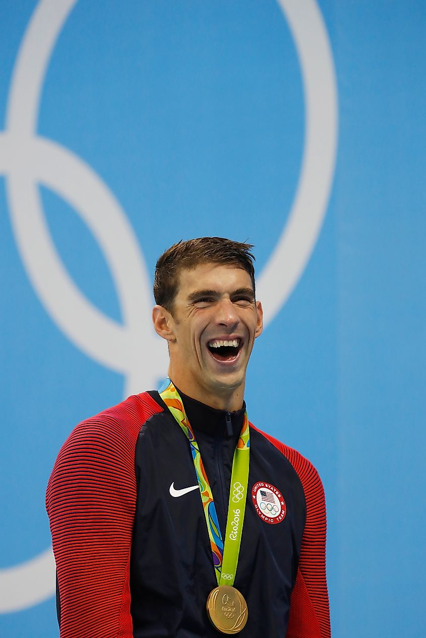 Michael Phelps gold medal at Rio 2016 Olympic Games 200m butterfly swim. Editorial credit: Focus Pix / Shutterstock.com