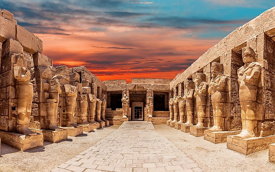 The statues of the Great Temple of Amun at sunset, with the stunning Karnak Temple in Luxor, Egypt