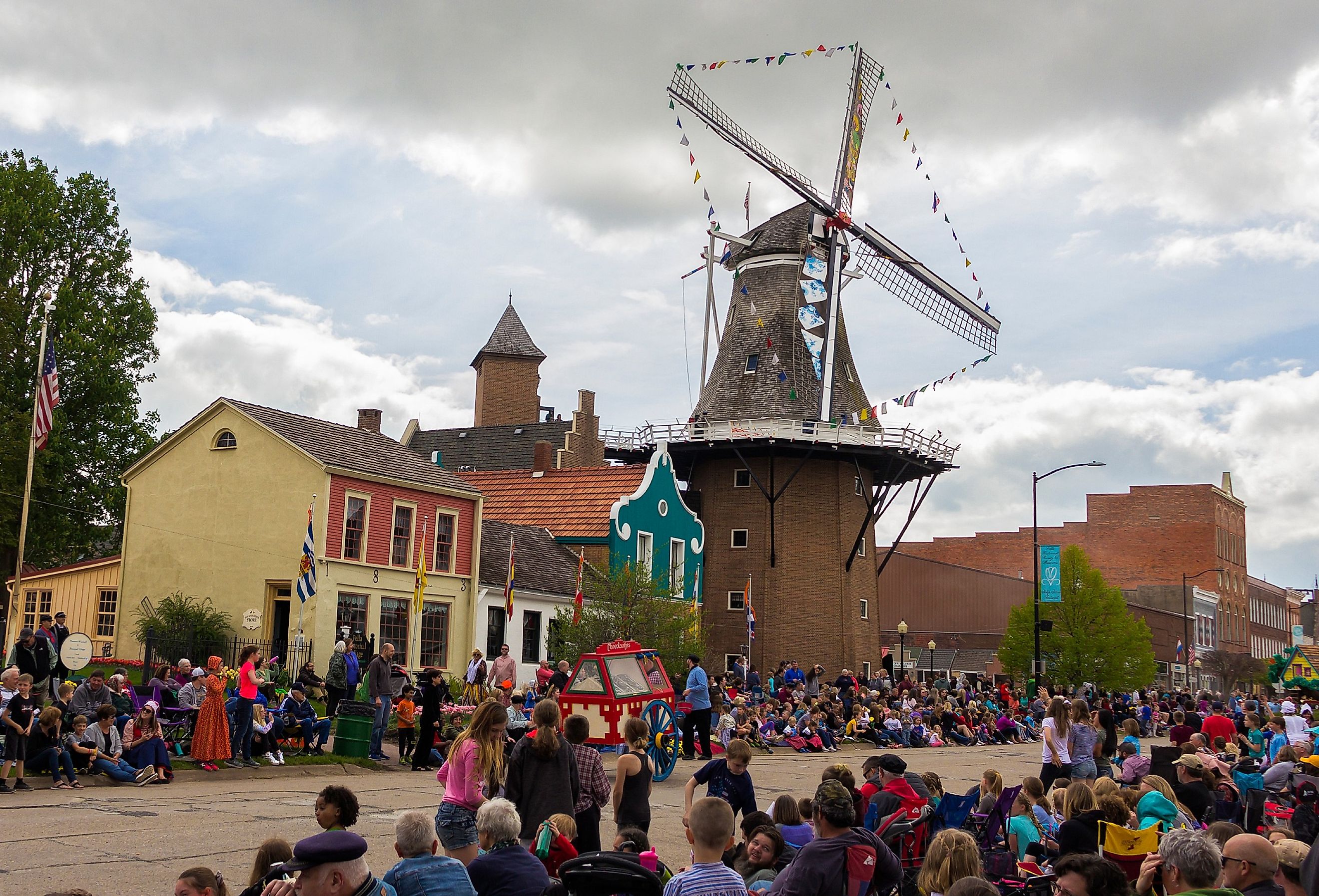 Downtown Pella, Iowa, during the Tulip Time Festival Parade. Image credit yosmoes815 via Shutterstock