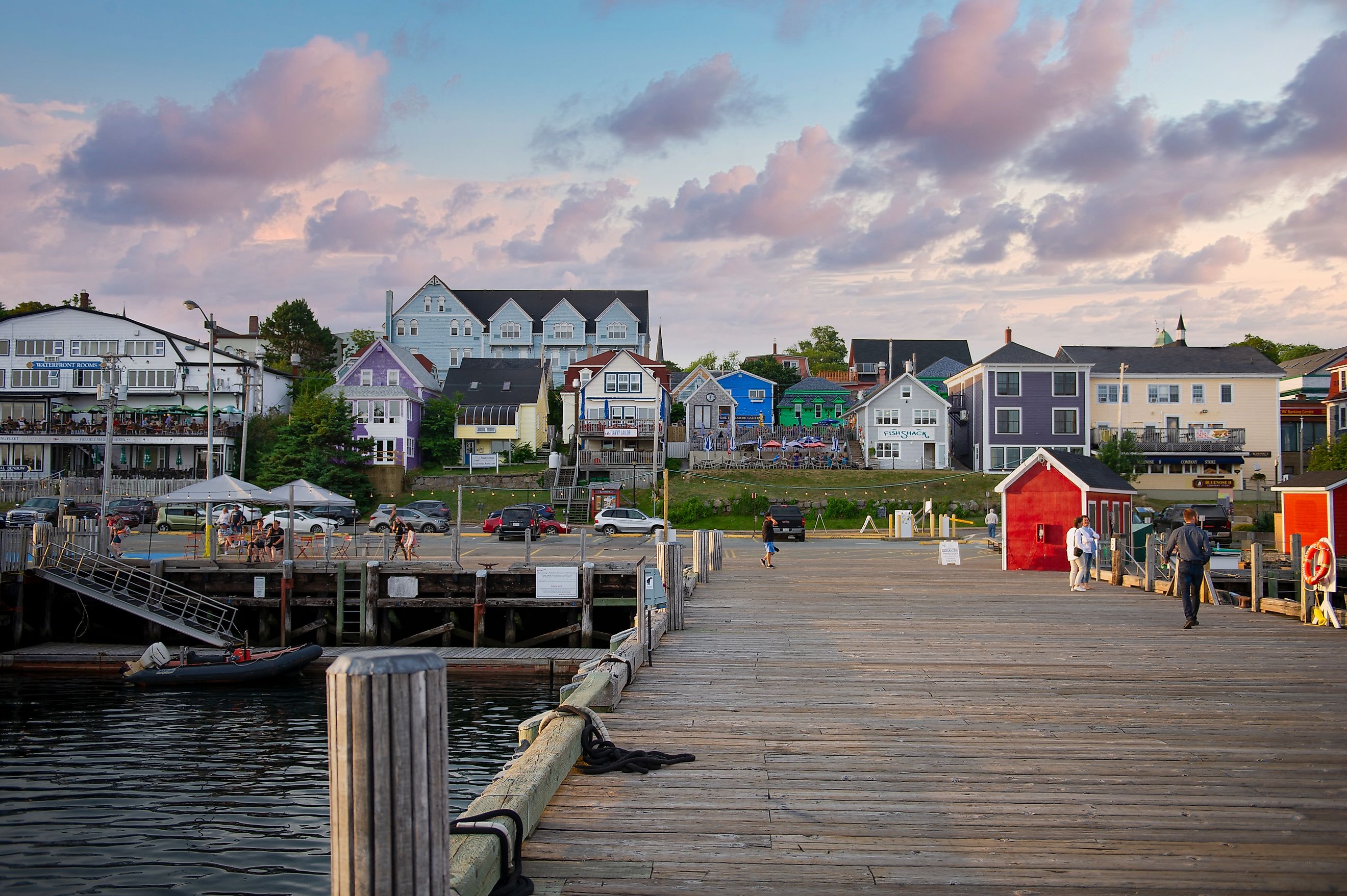 A glimpse of the waterfront in Lunenburg, Nova Scotia, from the water on a cloudy summer day.