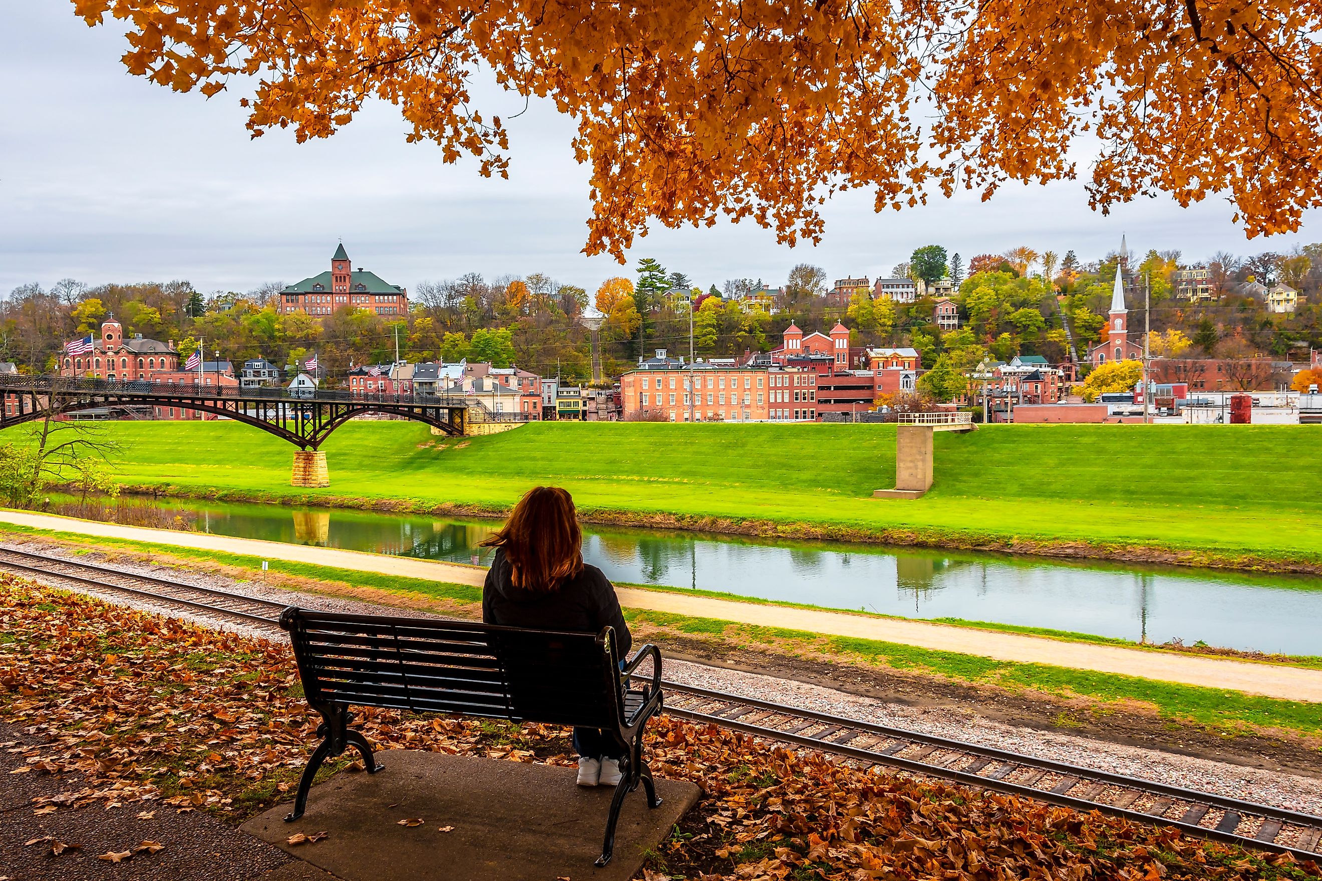 Autumn view of Grant Park in Galena, Illinois, with vibrant fall foliage and the historic town in the background.