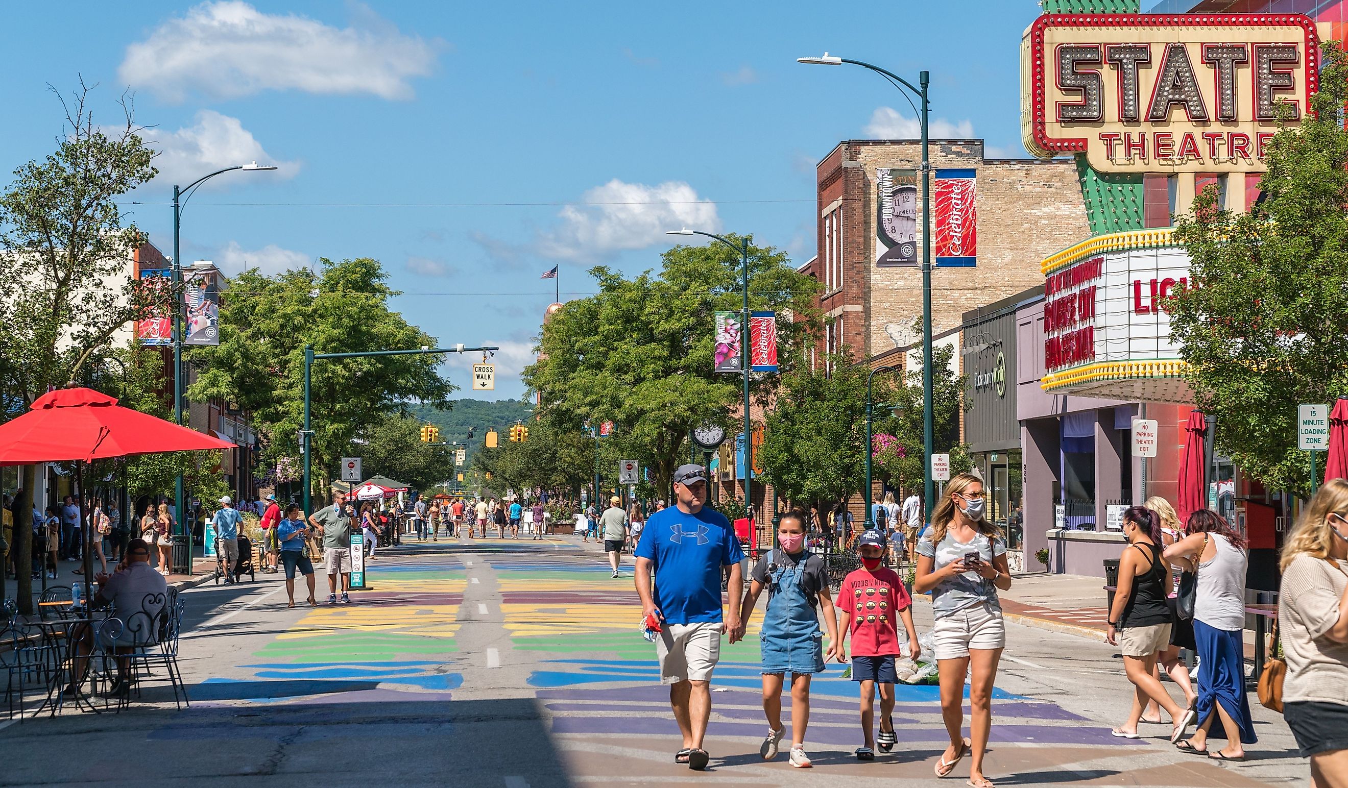 Busy Front Street in downtown with State Street Theater, in Traverse City, MI. Editorial credit: Heidi Besen / Shutterstock.com