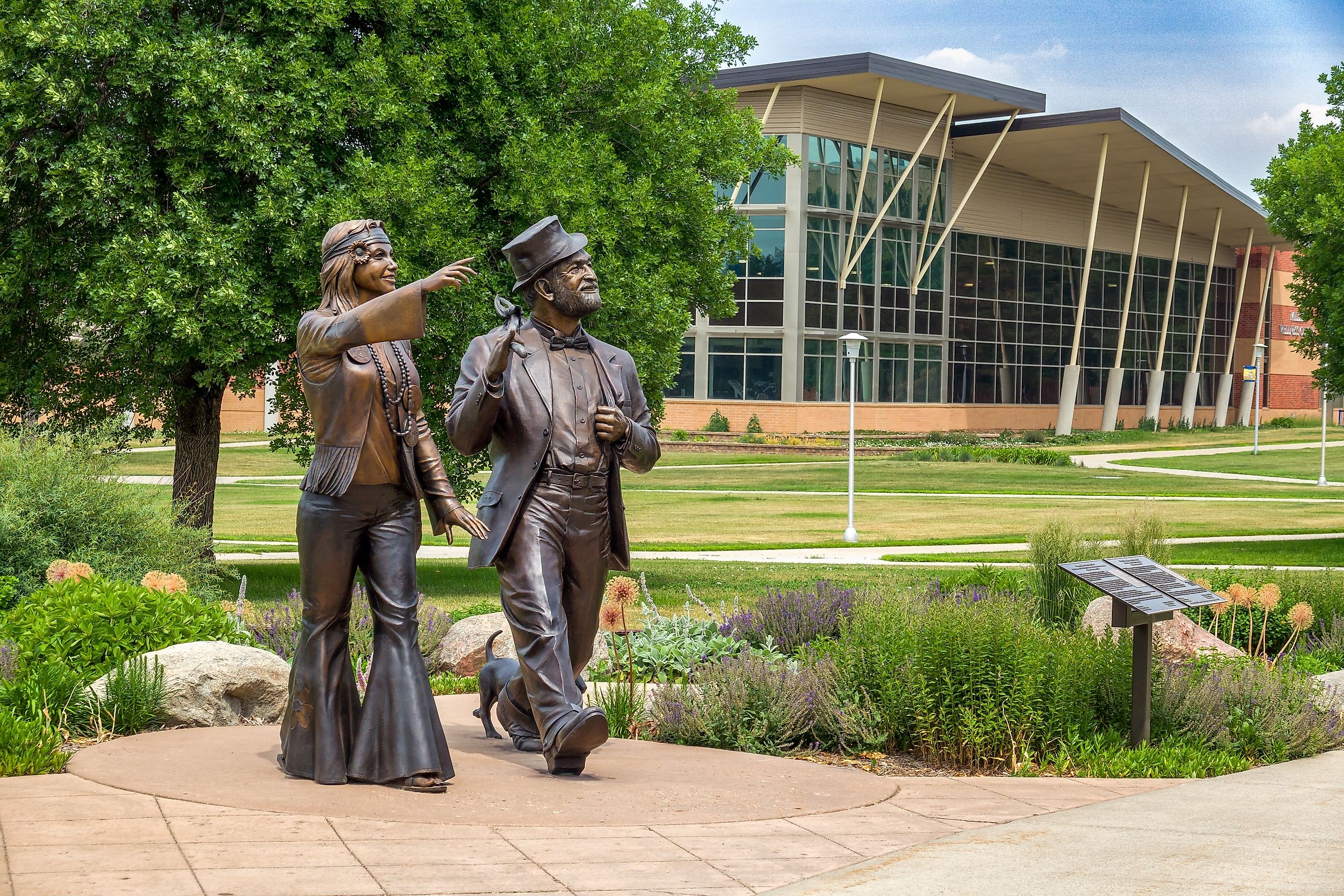 BROOKINGS, SD, USA - JUNE 21, 2023: Weary Willy-The Spirit Lives and Dirty Lil and Women in Hobo Day Statues on the campus of South Dakota State University. Editorial credit: Ken Wolter / Shutterstock.com