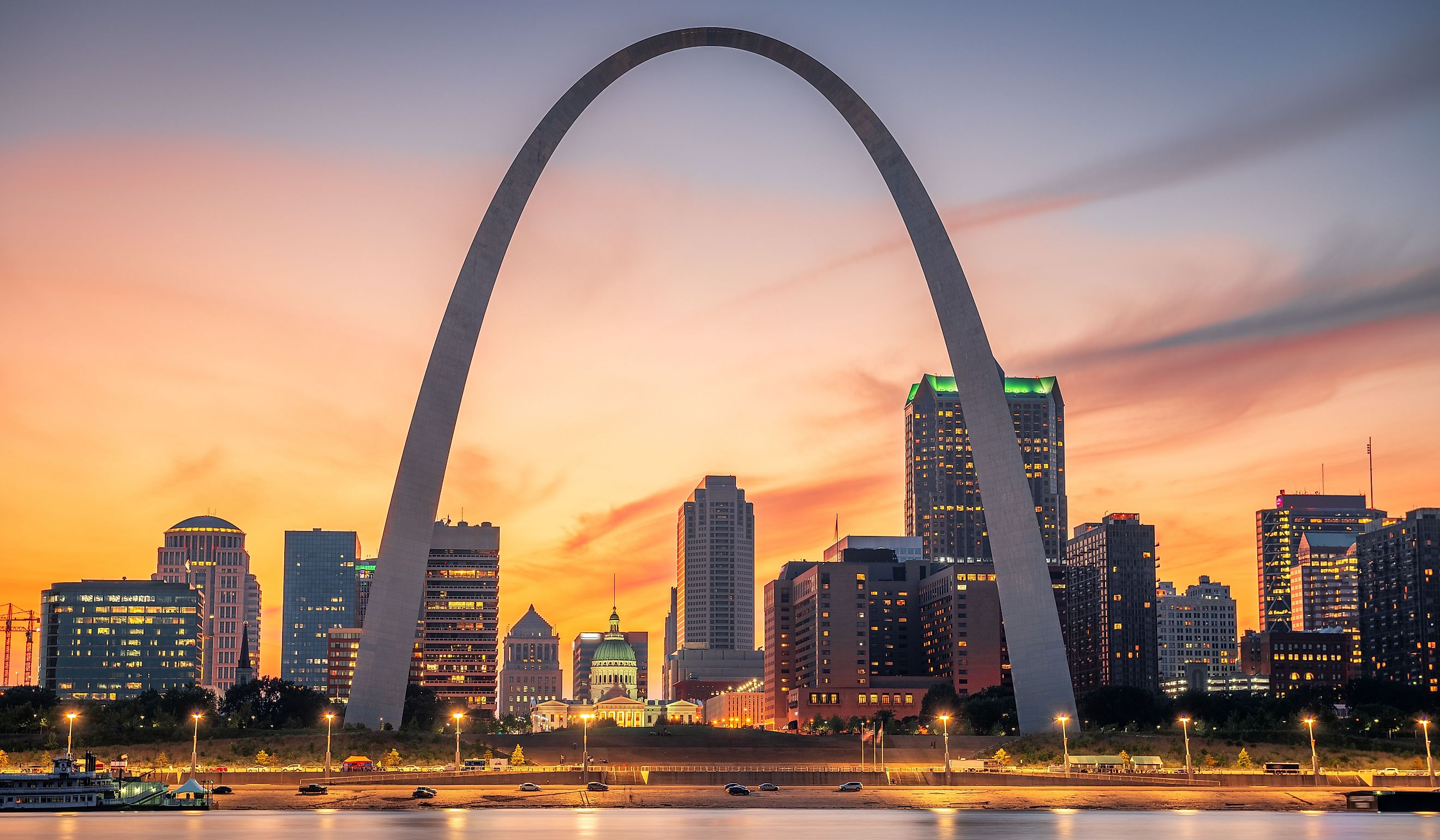 St. Louis, Missouri, USA downtown cityscape on the river at dusk.