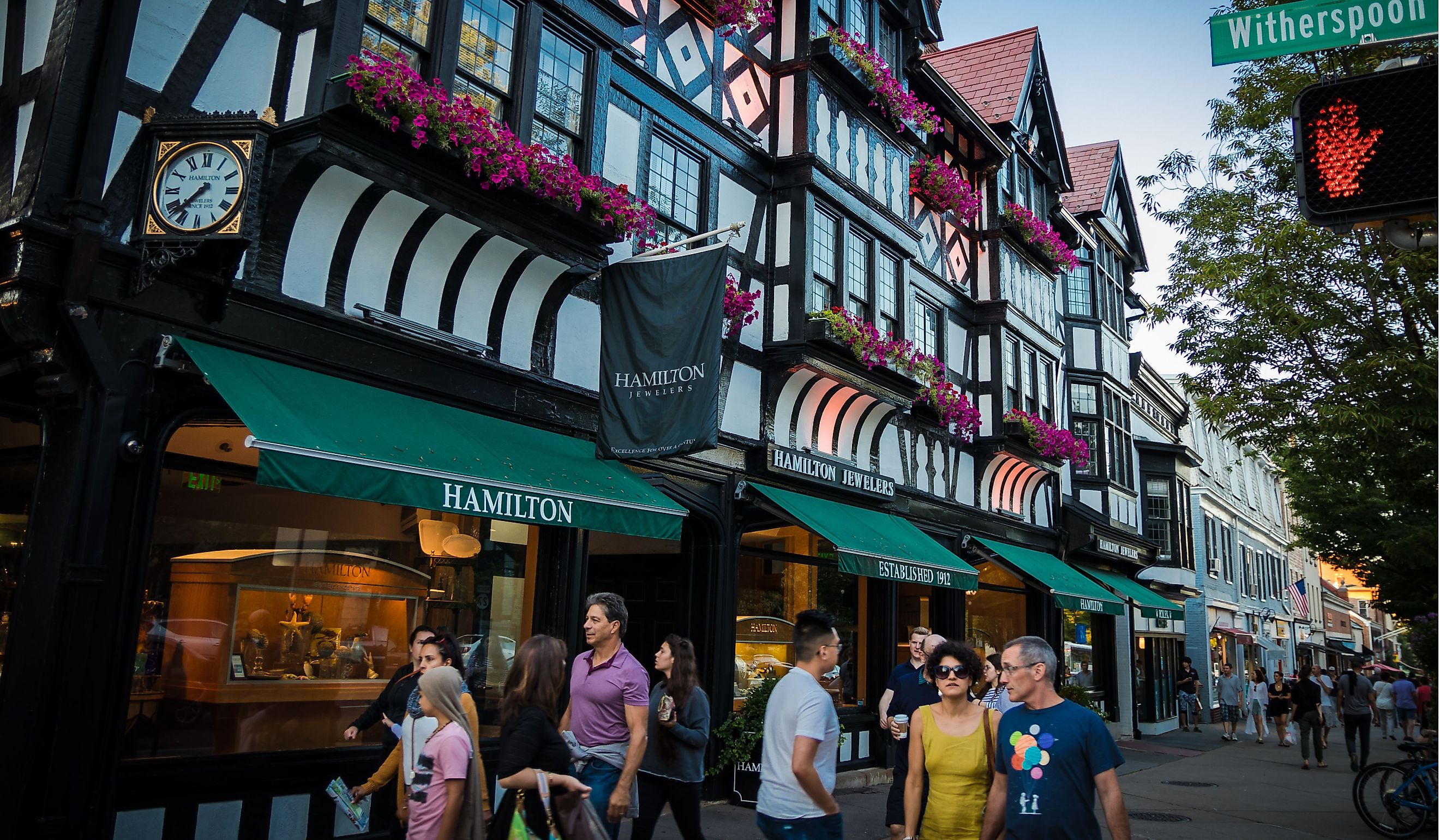 Shoppers and pedestrians near Tudor style building on Witherspoon Street in Princeton, New Jersey. Editorial credit: Benjamin Clapp / Shutterstock.com