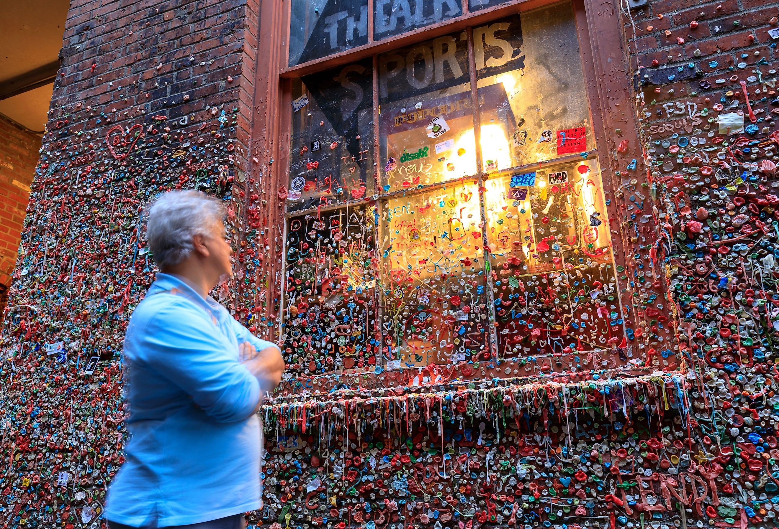 The Market Theater Gum Wall in downtown Seattle. It is a local landmark in downtown Seattle, in Post Alley under Pike Place Market. Image credit ARTYOORAN via Shutterstock.