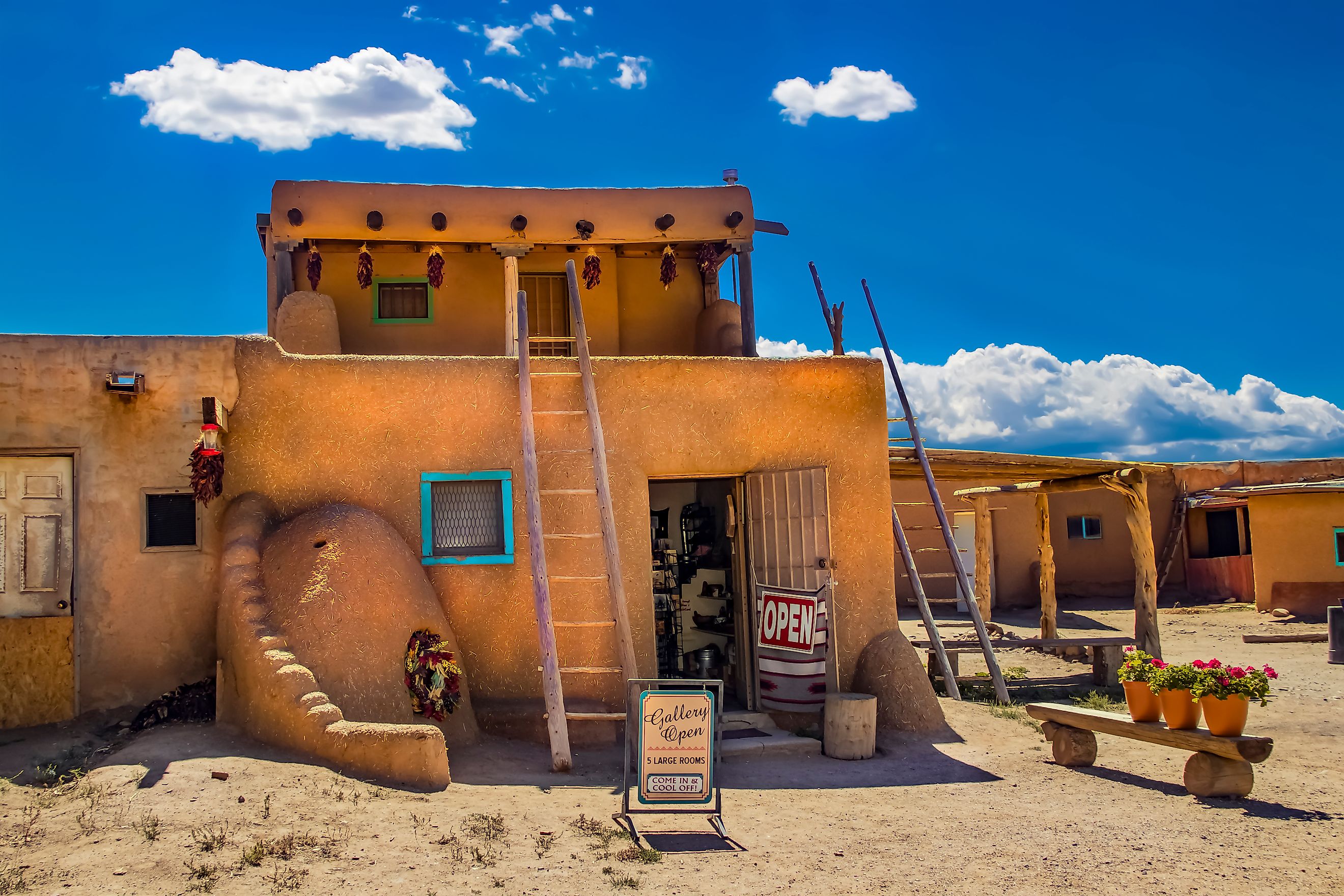 Art gallery open at the ancient adobe Taos Pueblo. Editorial credit: Vineyard Perspective / Shutterstock.com