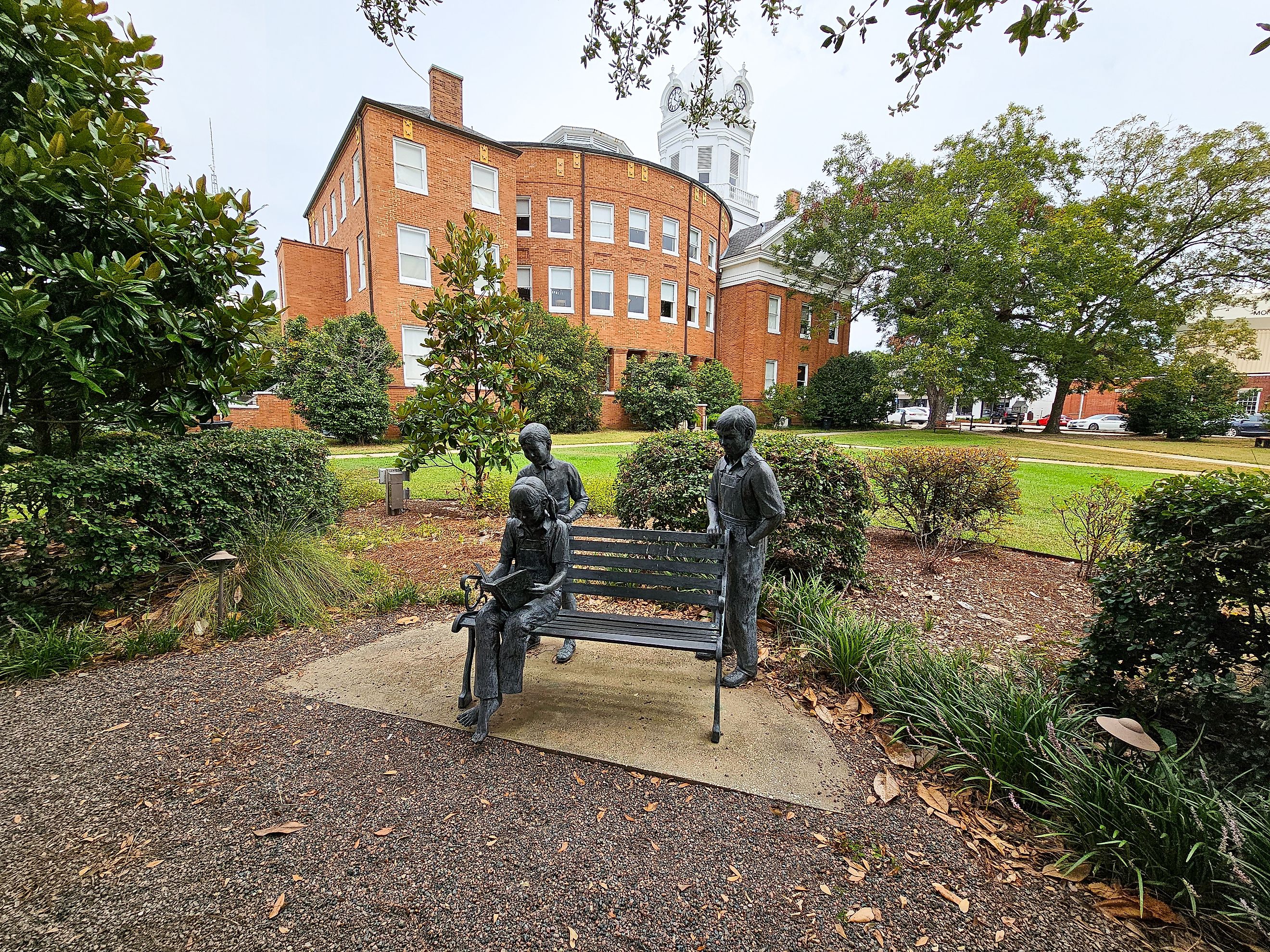 Monroeville, Alabama, USA - August 31, 2024: The "A Celebration of Reading Sculpture" by Branko Medencia. Editorial credit: VioletSkyAdventures / Shutterstock.com