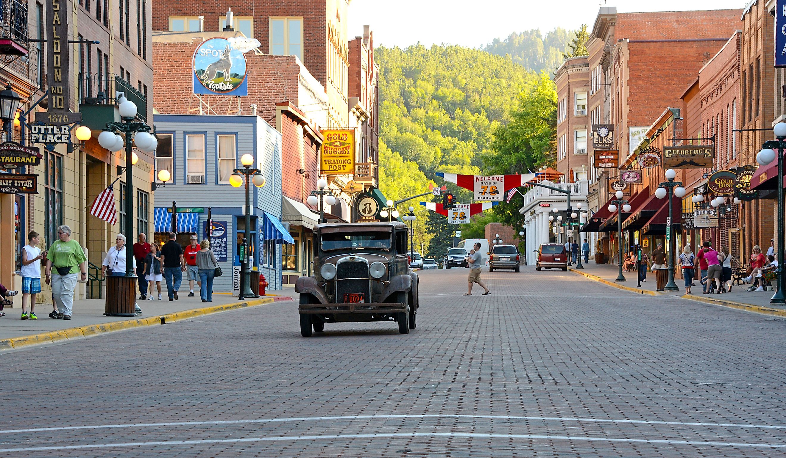 Vintage car approaching on main street in Deadwood. Editorial credit: Michael Kaercher / Shutterstock.com