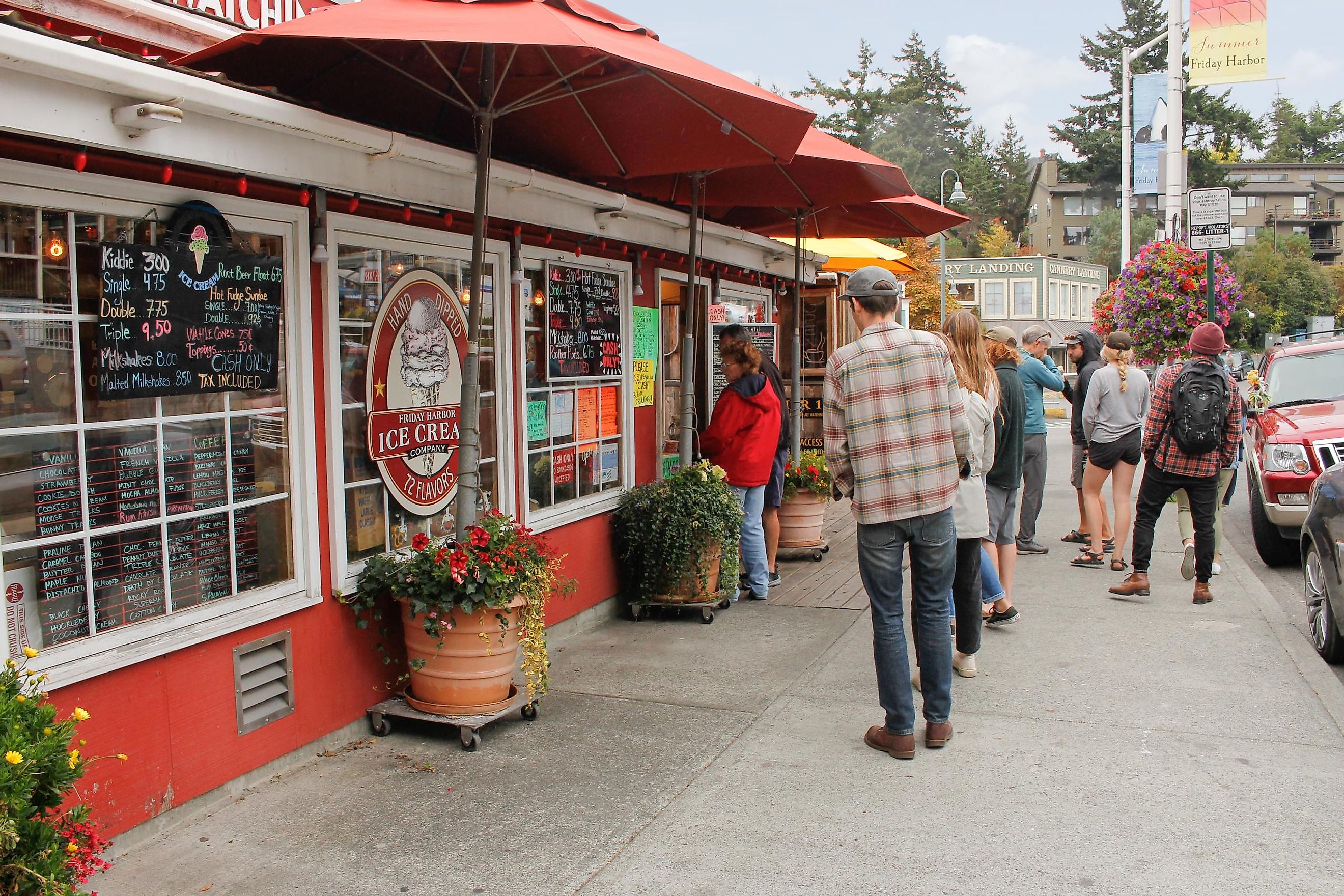 Friday Harbor, Washington, United States - 09-11-2021: A view of a line of hungry customers waiting to order at Friday Harbor Ice Cream Company. Editorial credit: The Image Party / Shutterstock.com