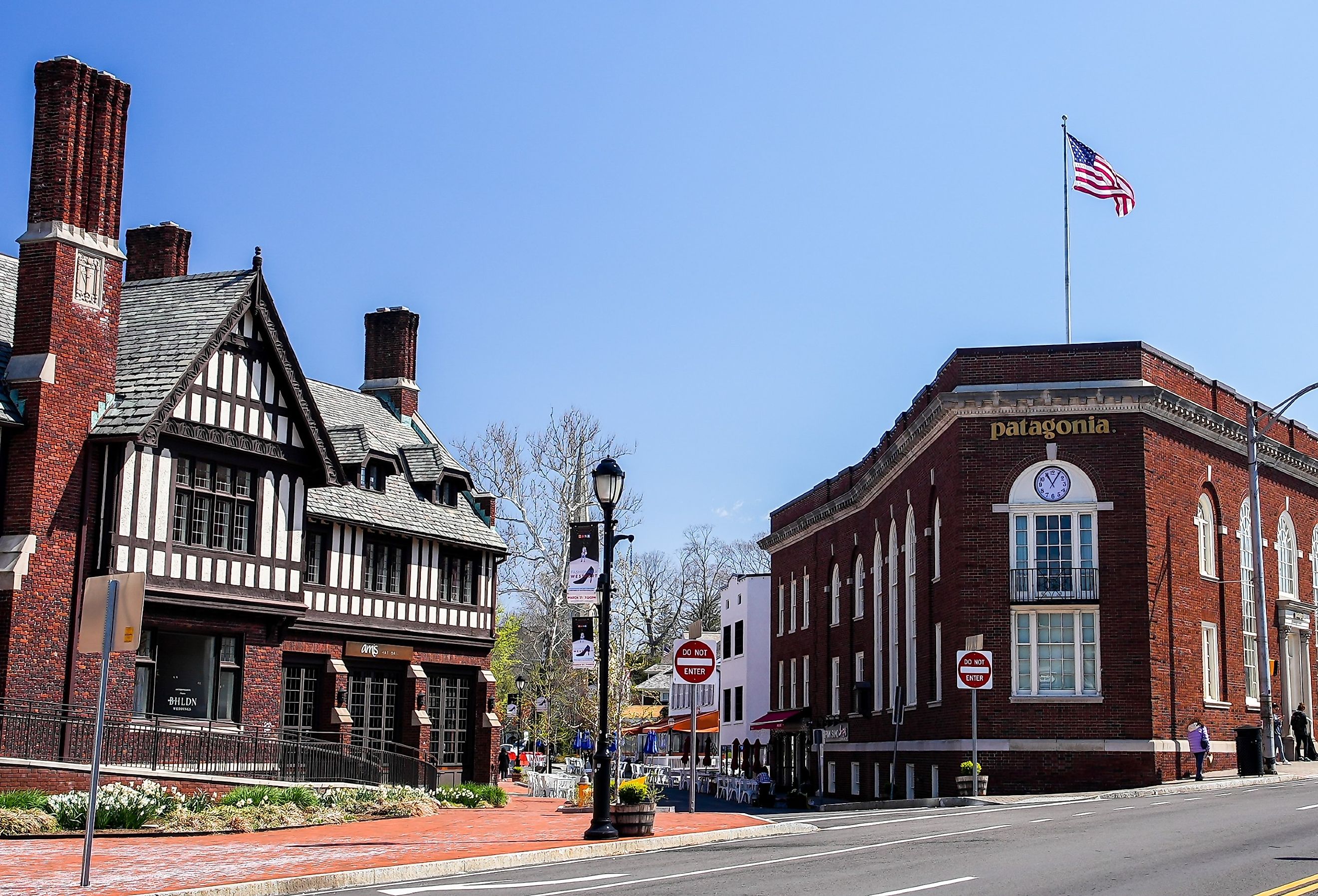Church Lane on a beautiful spring day with Patagonia store and Anthropologie store in Westport, Connecticut. Image credit Miro Vrlik Photography via Shutterstock