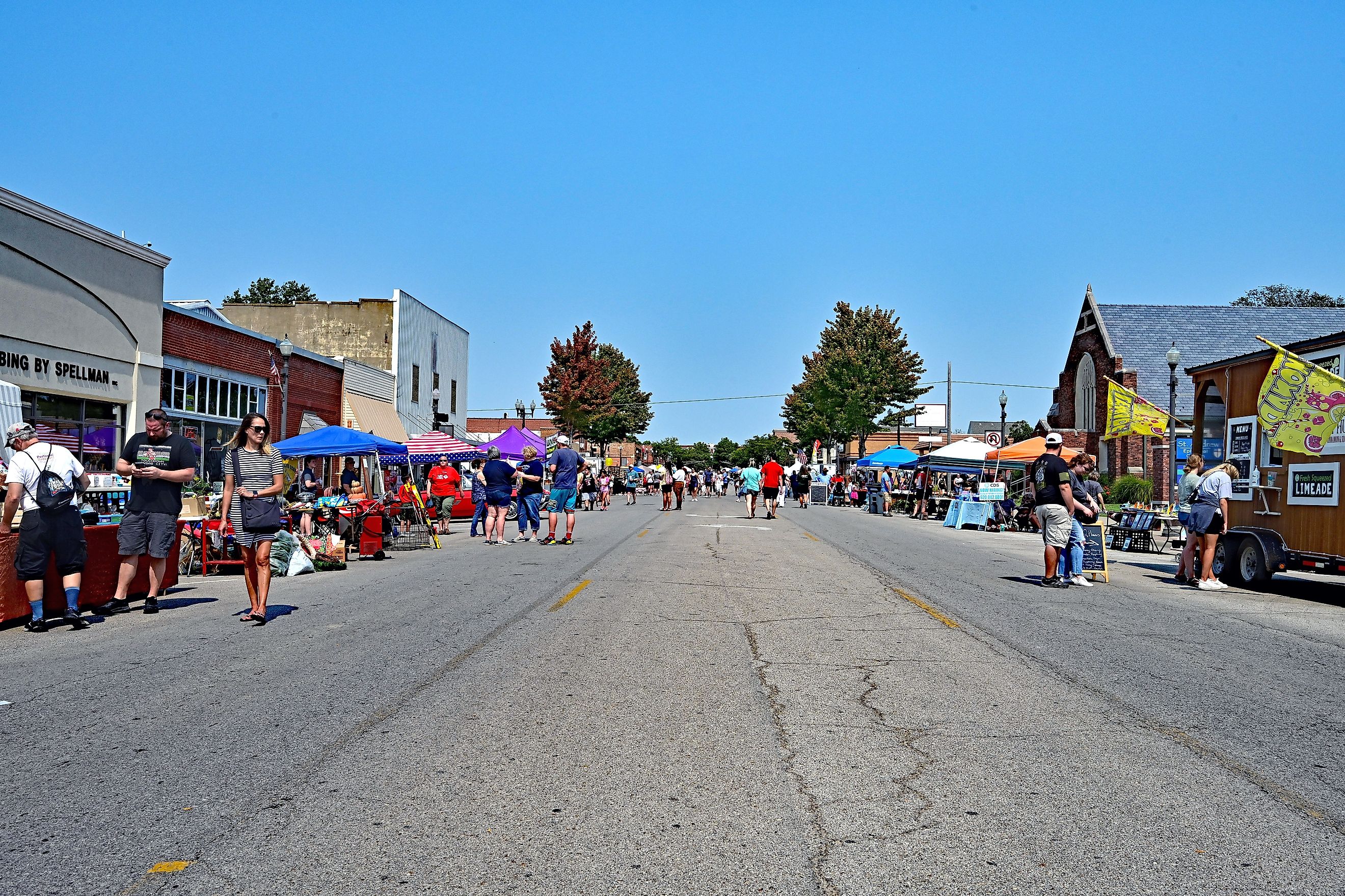 A busy downtown street in Emporia, Kansas. Image credit: Mark Reinstein / Shutterstock.com.