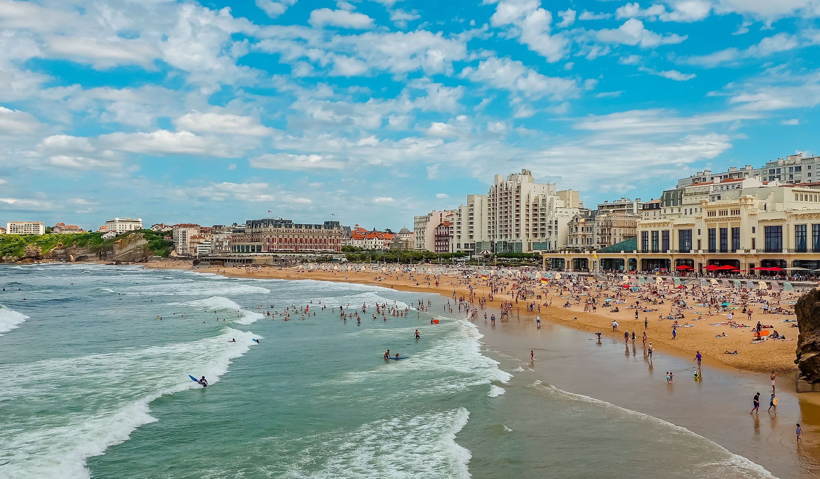 People on La Grande Plage - the Great Beach in Biarritz, France. Editorial credit: Roaming Pictures / Shutterstock.com