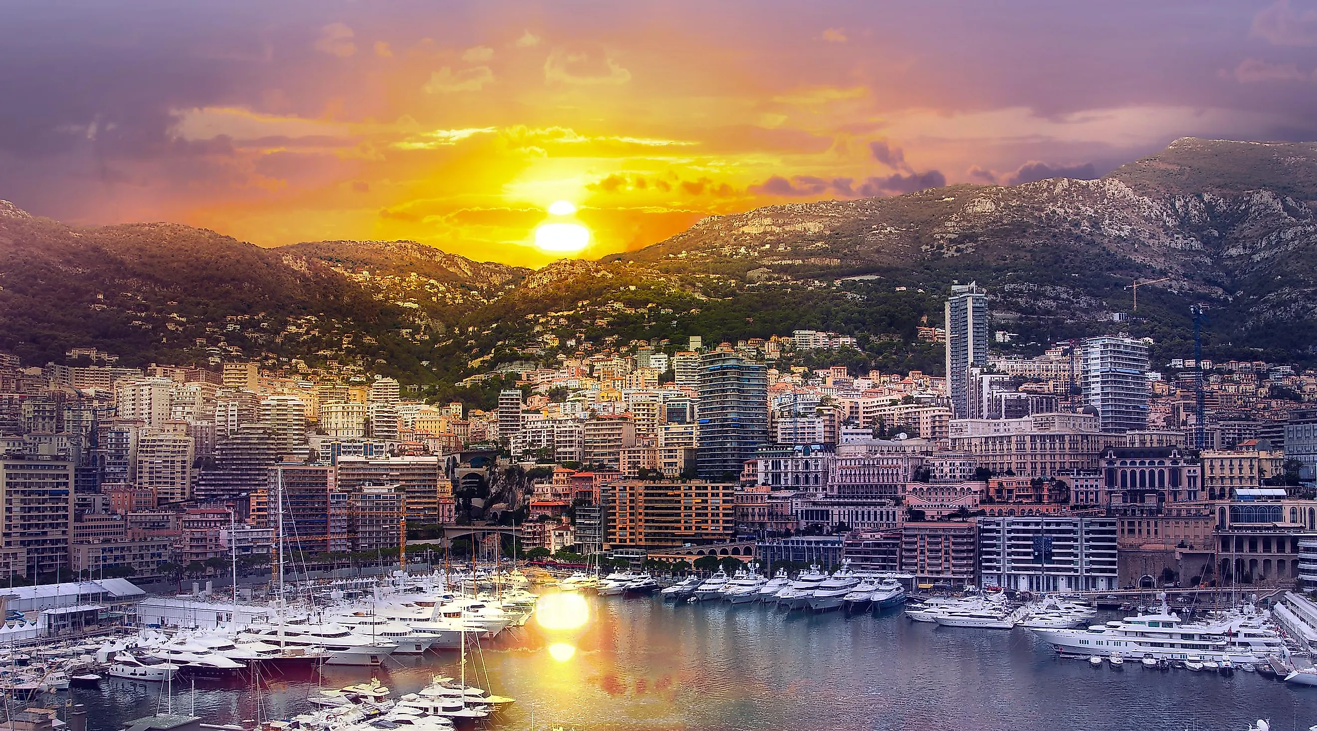 Main marina of Monte Carlo in Monaco, the country with the highest population density in Europe, at sunset.