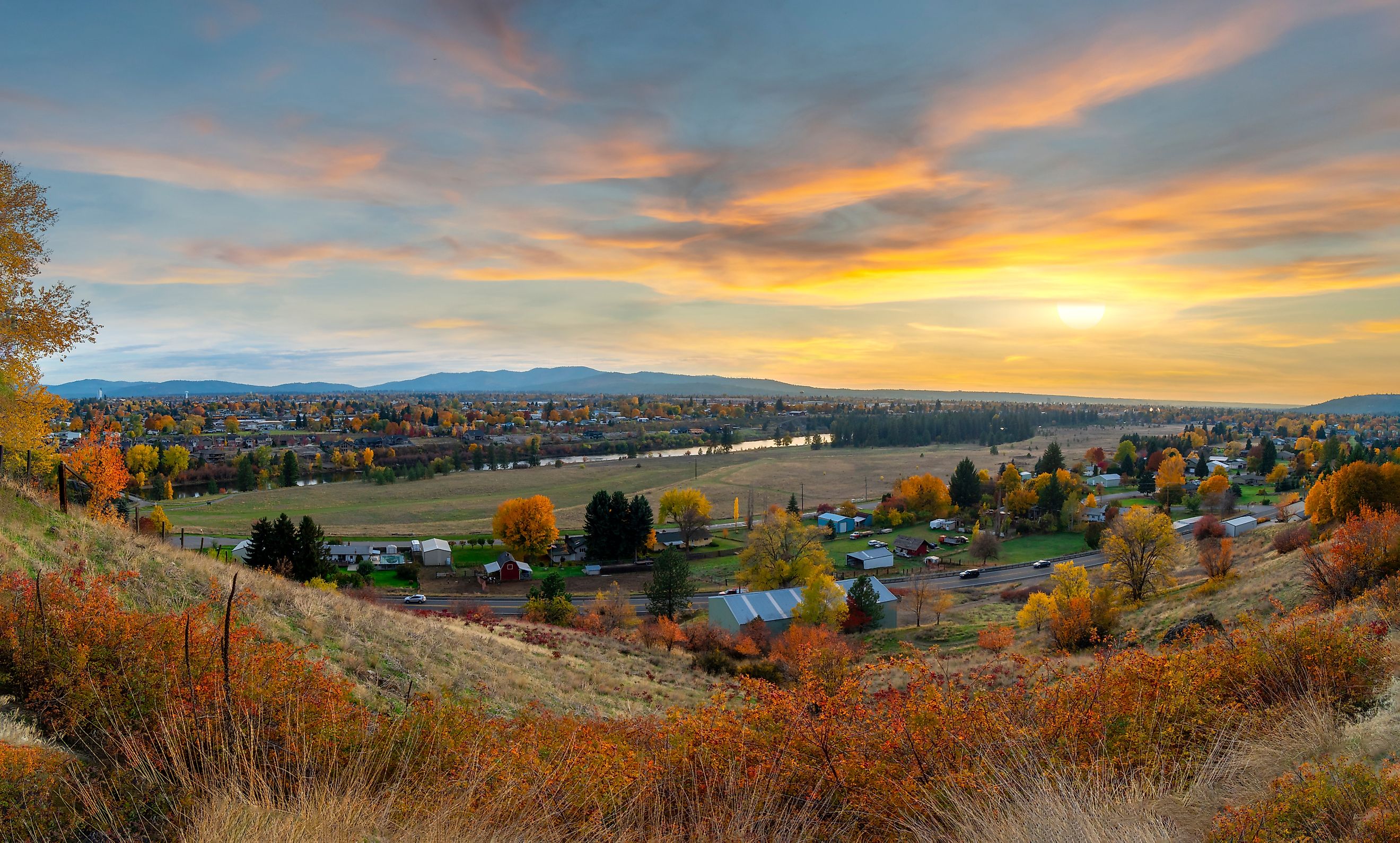 Panoramic hillside view over rural Spokane Valley, looking toward downtown Spokane, Washington.