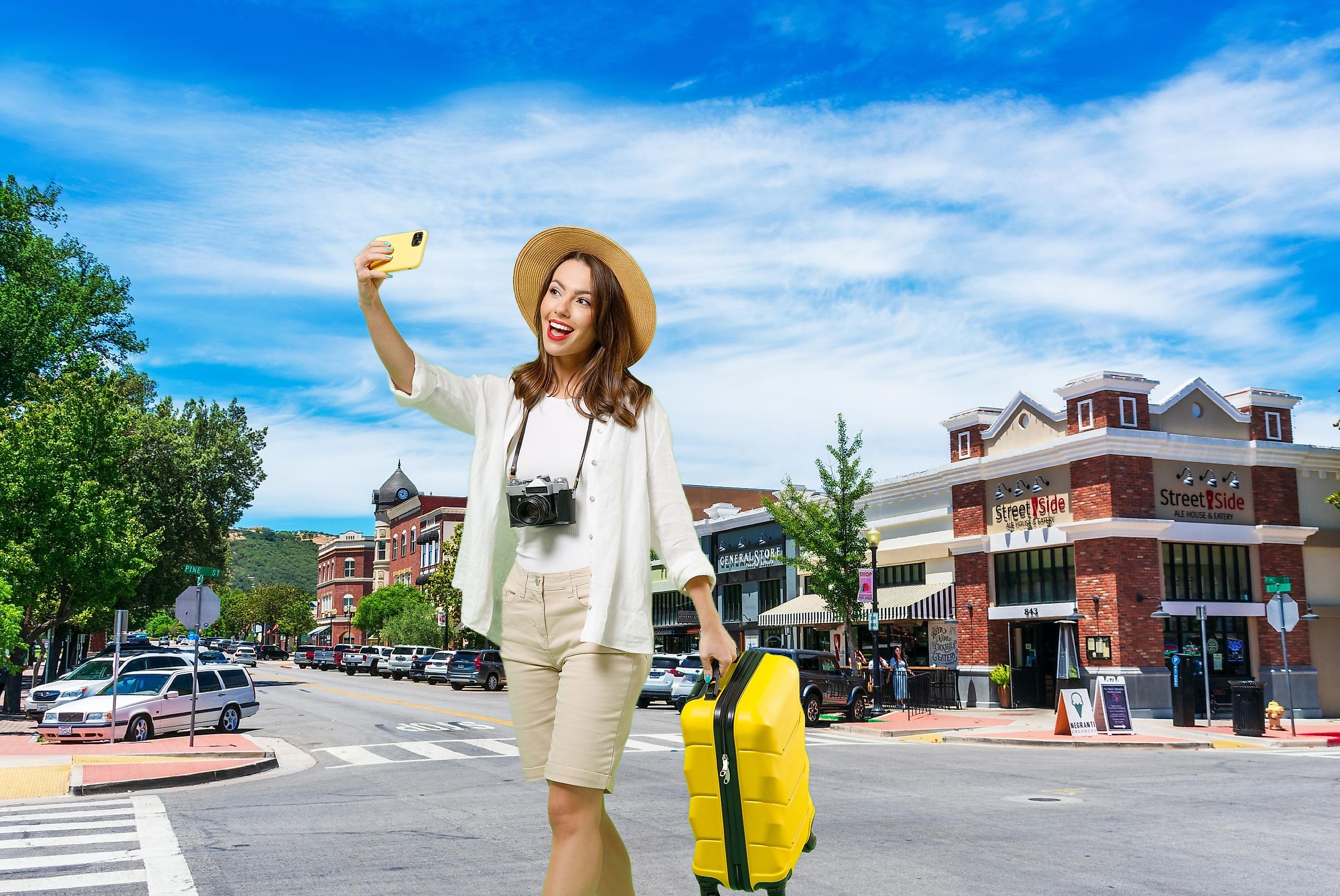 Cars parked in Downtown Paso Robles along 12th street with historic Clock Tower Acorn Building in background, via Michael Vi / Shutterstock.com