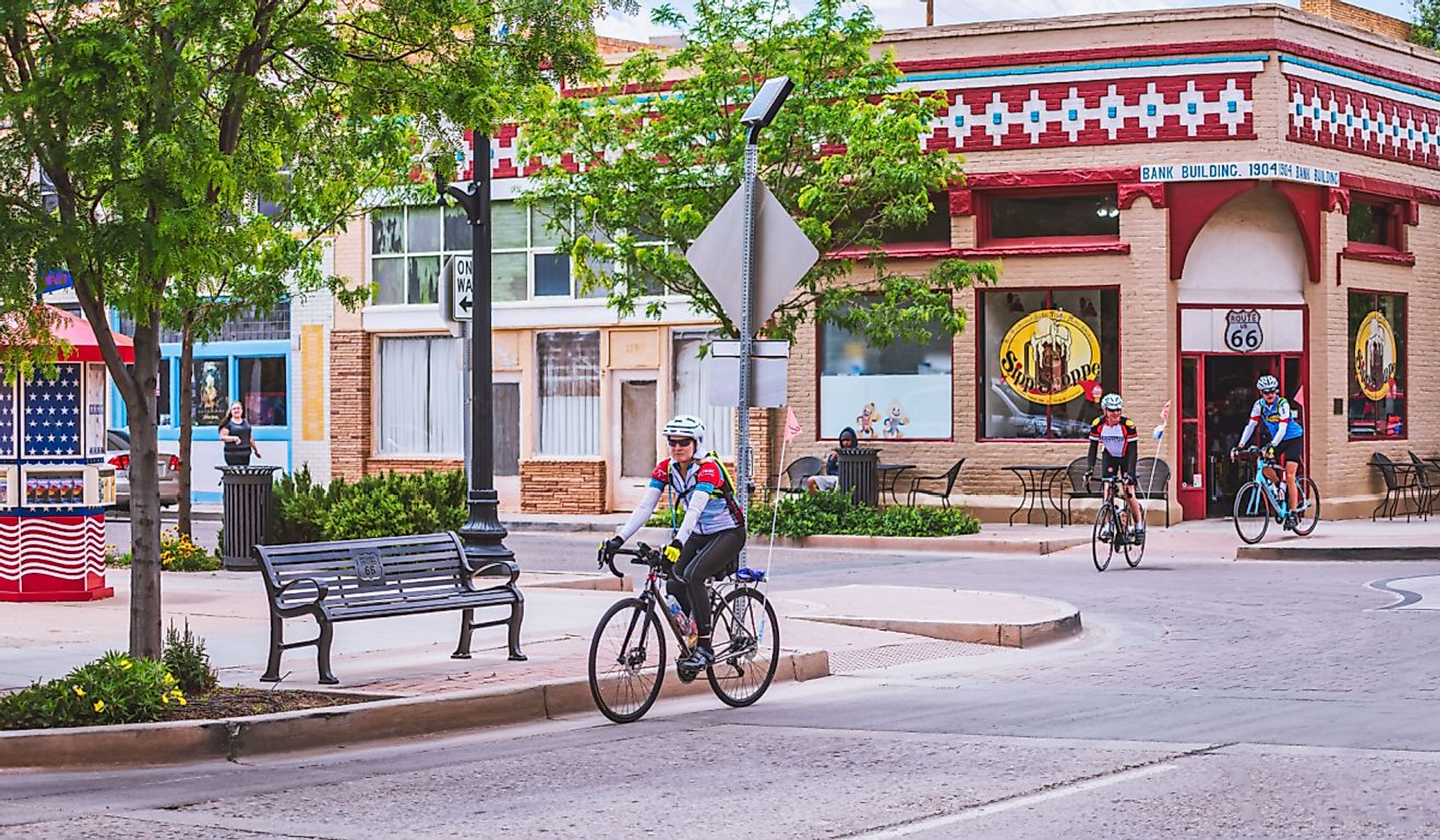 Cyclist traveling along route 66 in Winslow, Arizona. Image credit Terry Kelly via Shutterstock