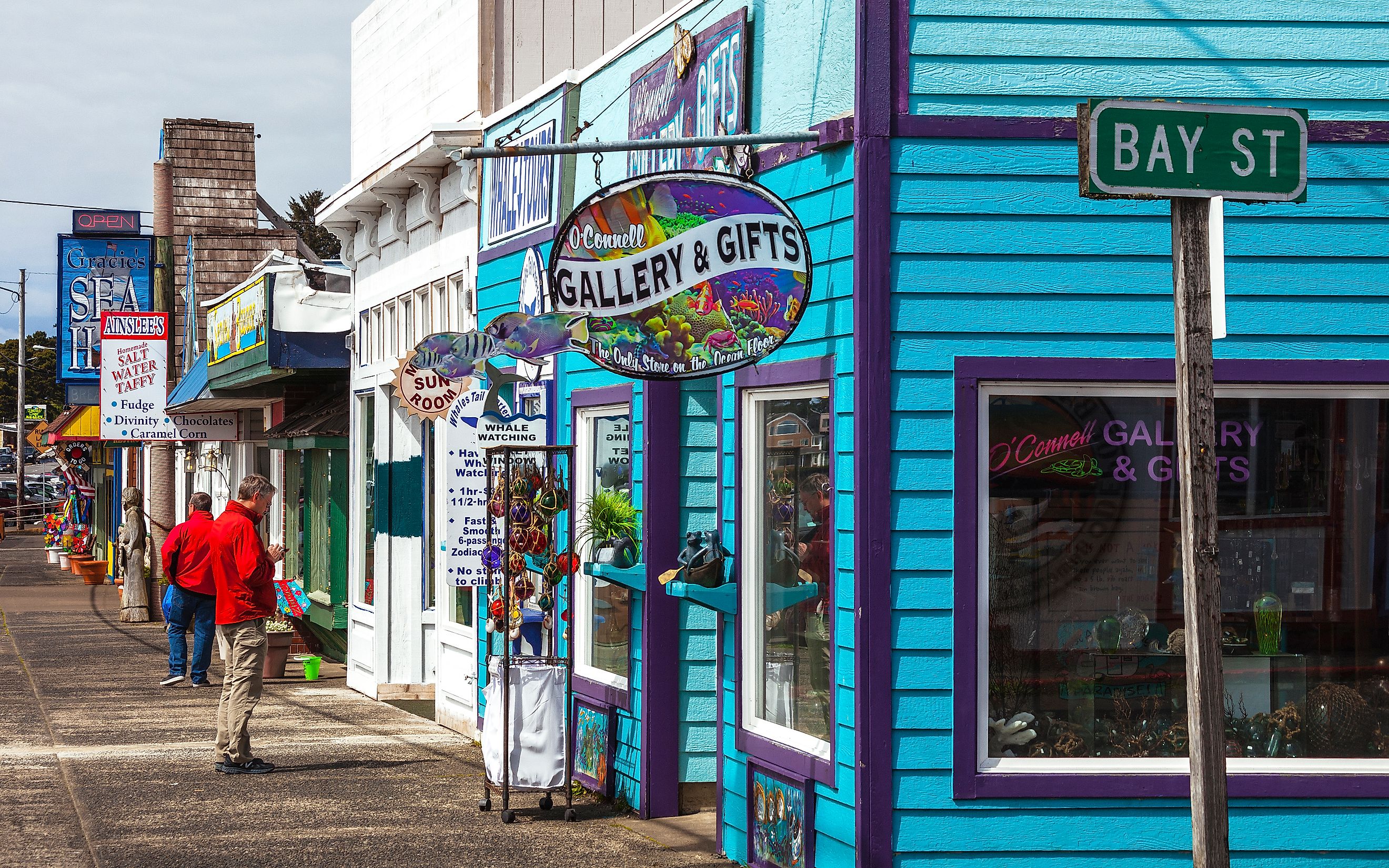 Depoe Bay, Oregon, USA - Colorful shops at main street of small coastal town, via peeterv / iStock.com