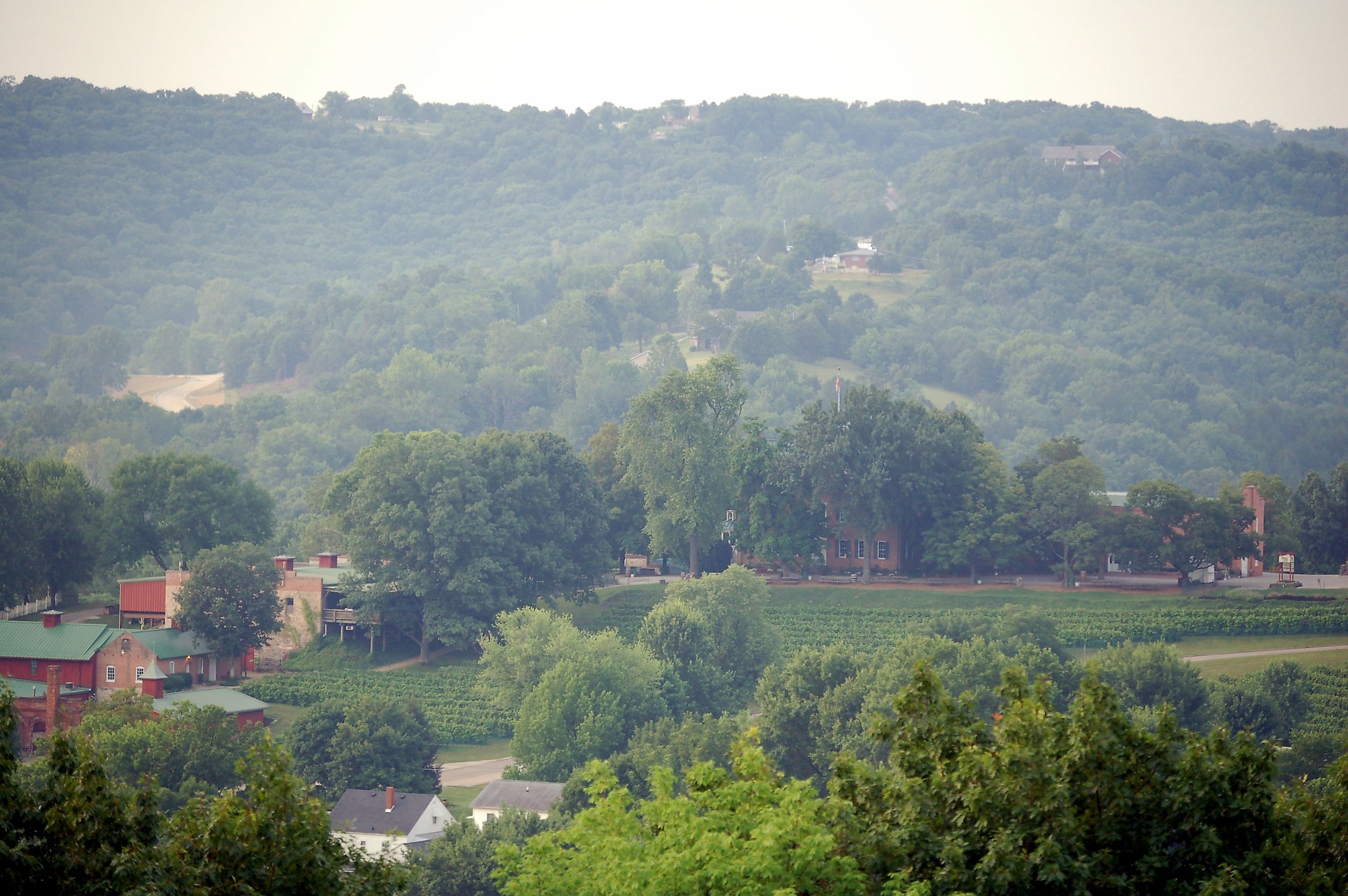 Missouri winery Stone Hill Winery in the lower left corner with vineyards and the greater Hermann AVA among the Ozark hills. SkippyThePeanutButterMan via Wikimedia Commons