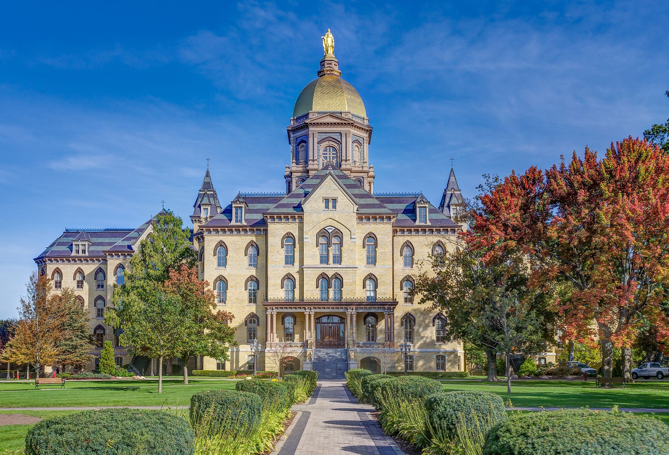 Main Administration Building known as the "Golden Dome" on the campus of Notre Dame University, Indiana in the fall. Image credit Ken Wolter via Shutterstock