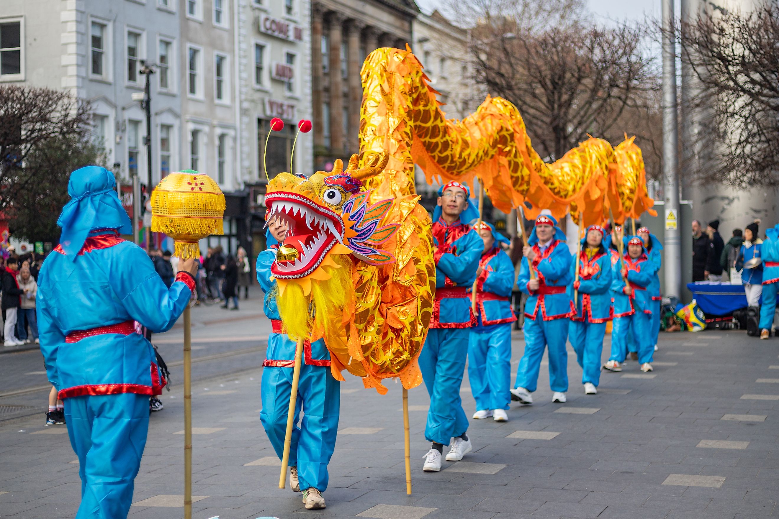Falun Gong practitioners perform a dragon dance on O'Connell Street to celebrate the Lunar New Year. Image by LiamMurphyPics via Shutterstock.com