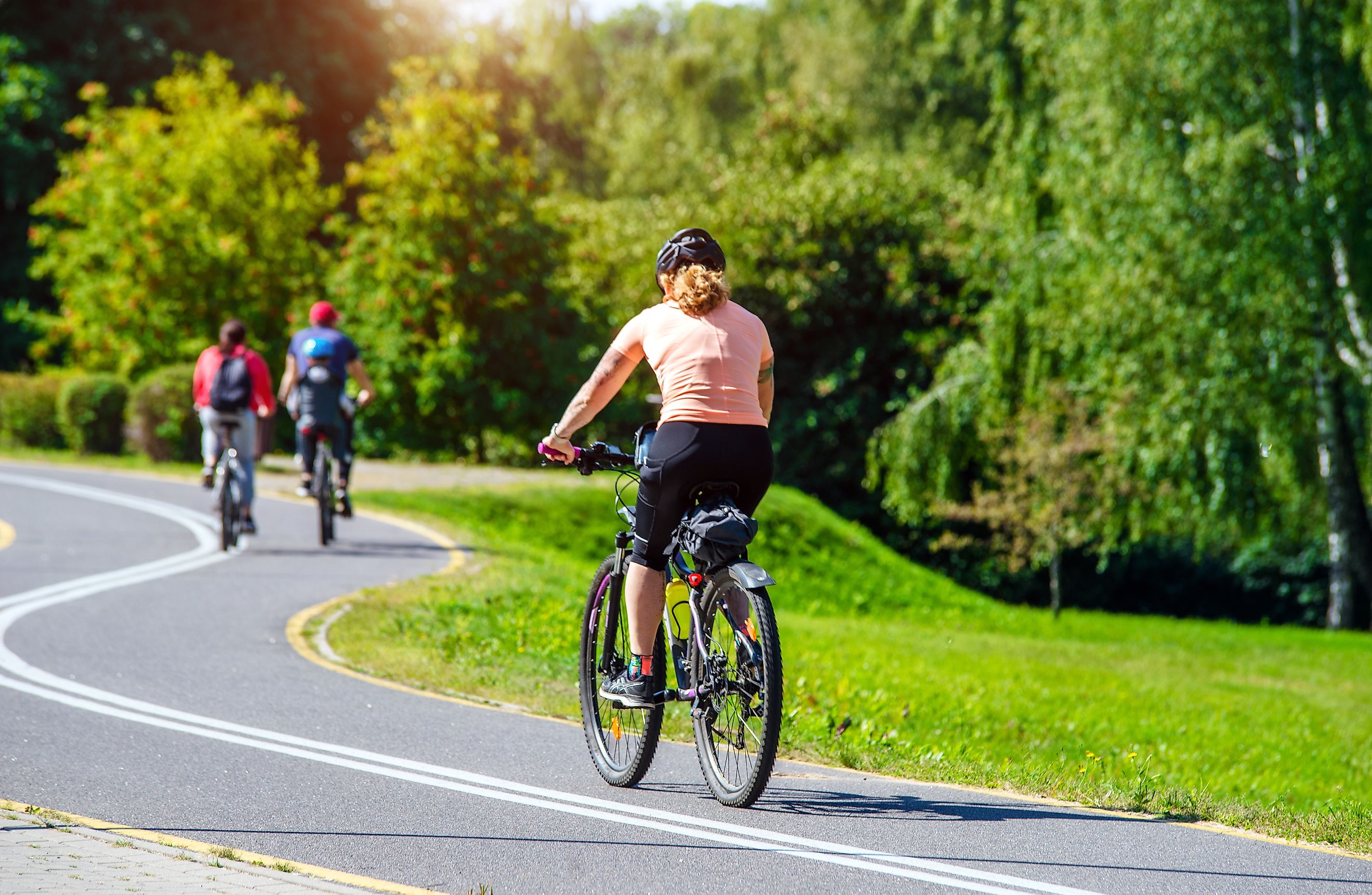 Cyclist ride on the bike path in the city Park