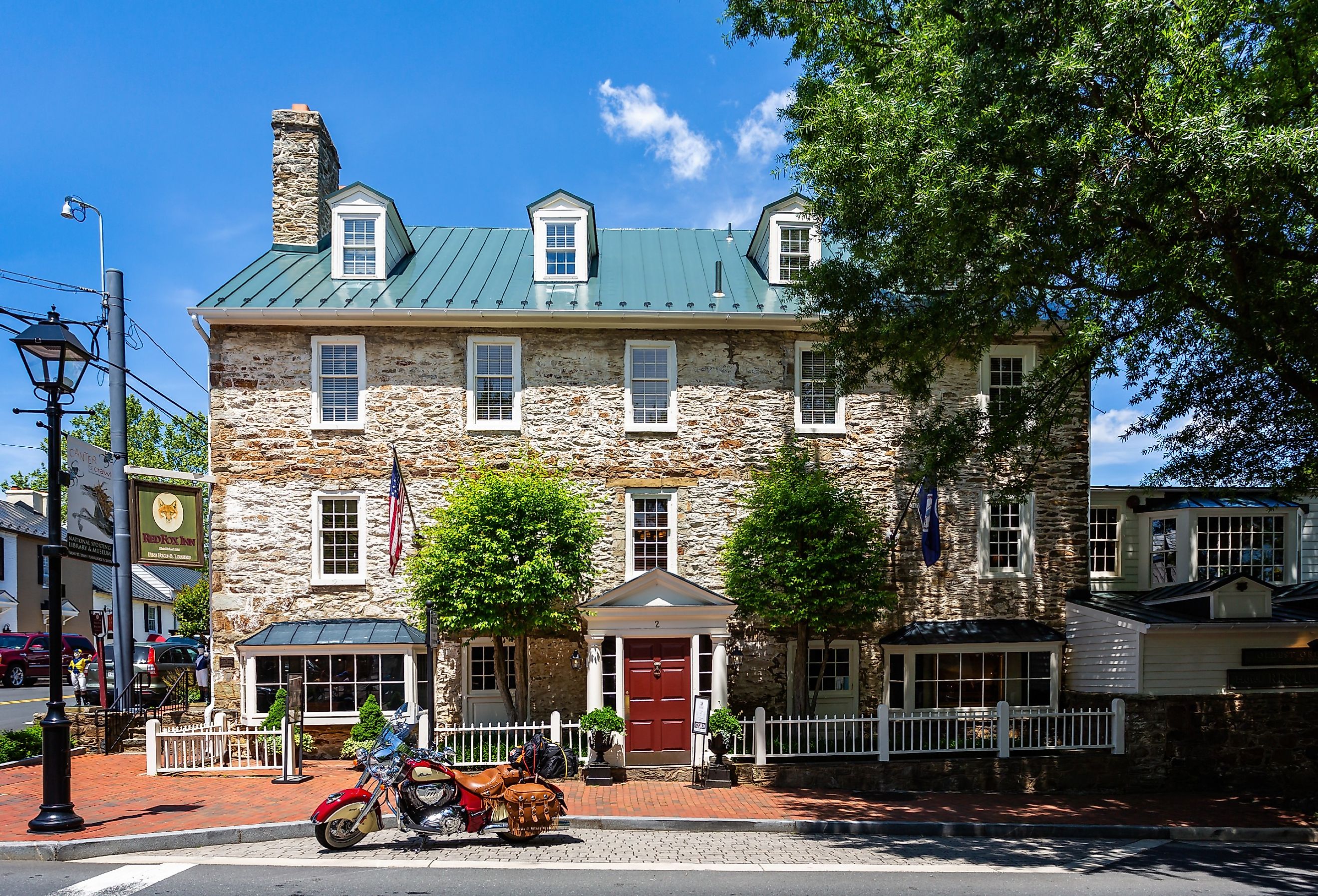 Indian 111 Classic Motorbike parked outside The Red Fox Inn and Tavern in Middleburg, Virginia. Image credit Nigel Jarvis via Shutterstock