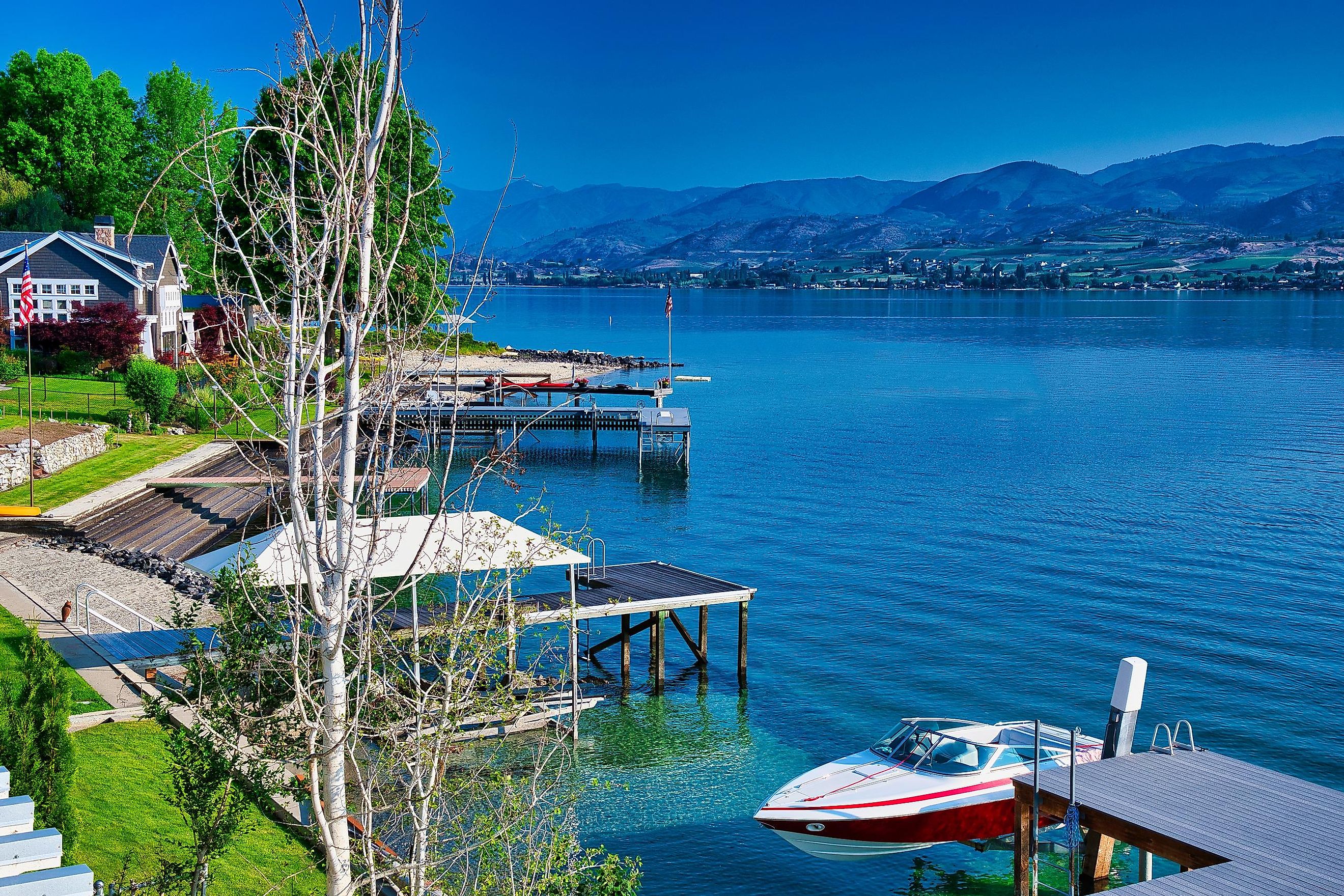 Boats docked along the shores of Lake Chelan in Washington.