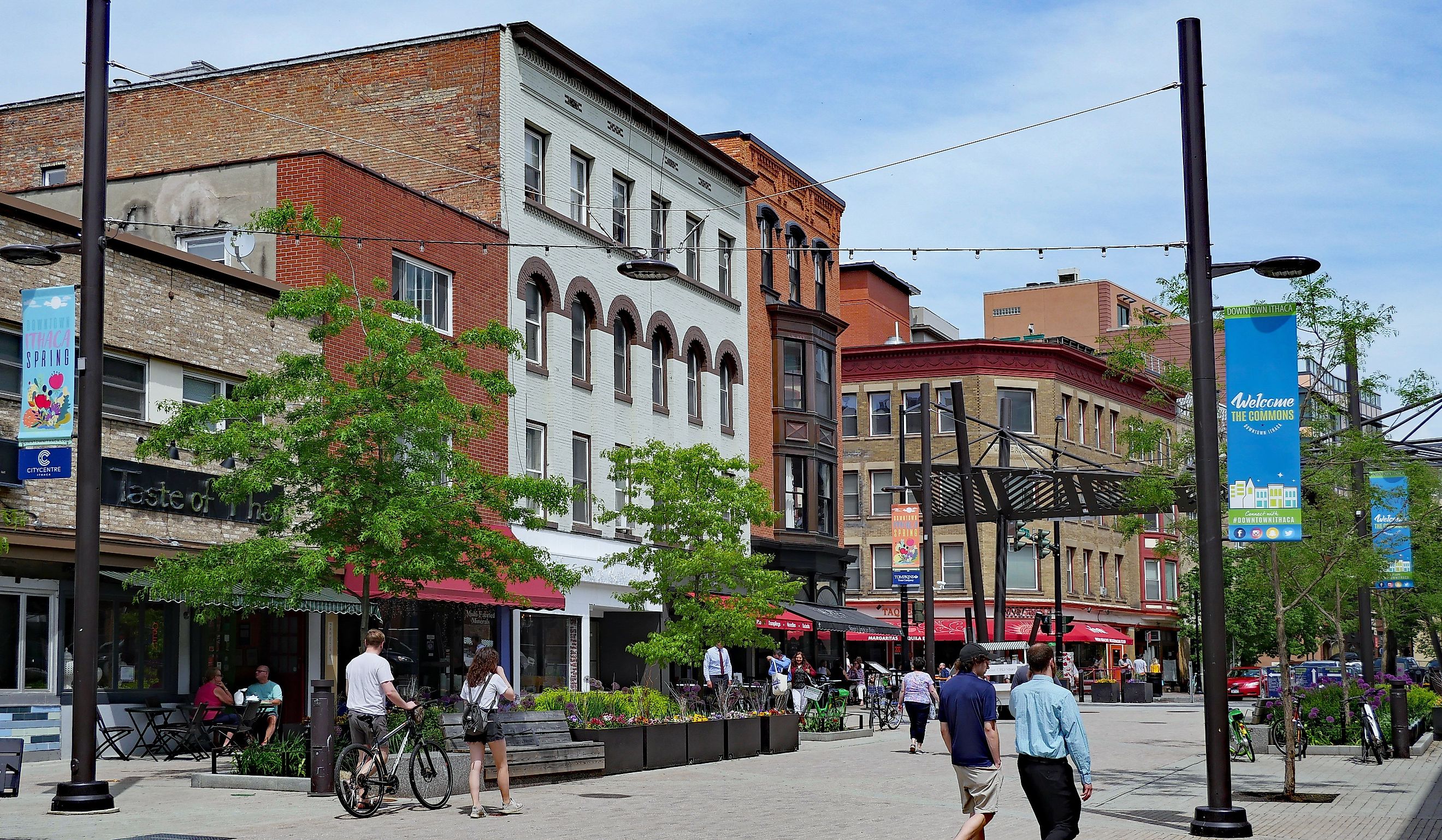 Ithaca, the home of Cornell University, has a lively downtown with shopping and restaurants, including this pedestrianized street. Editorial credit: Spiroview Inc / Shutterstock.com