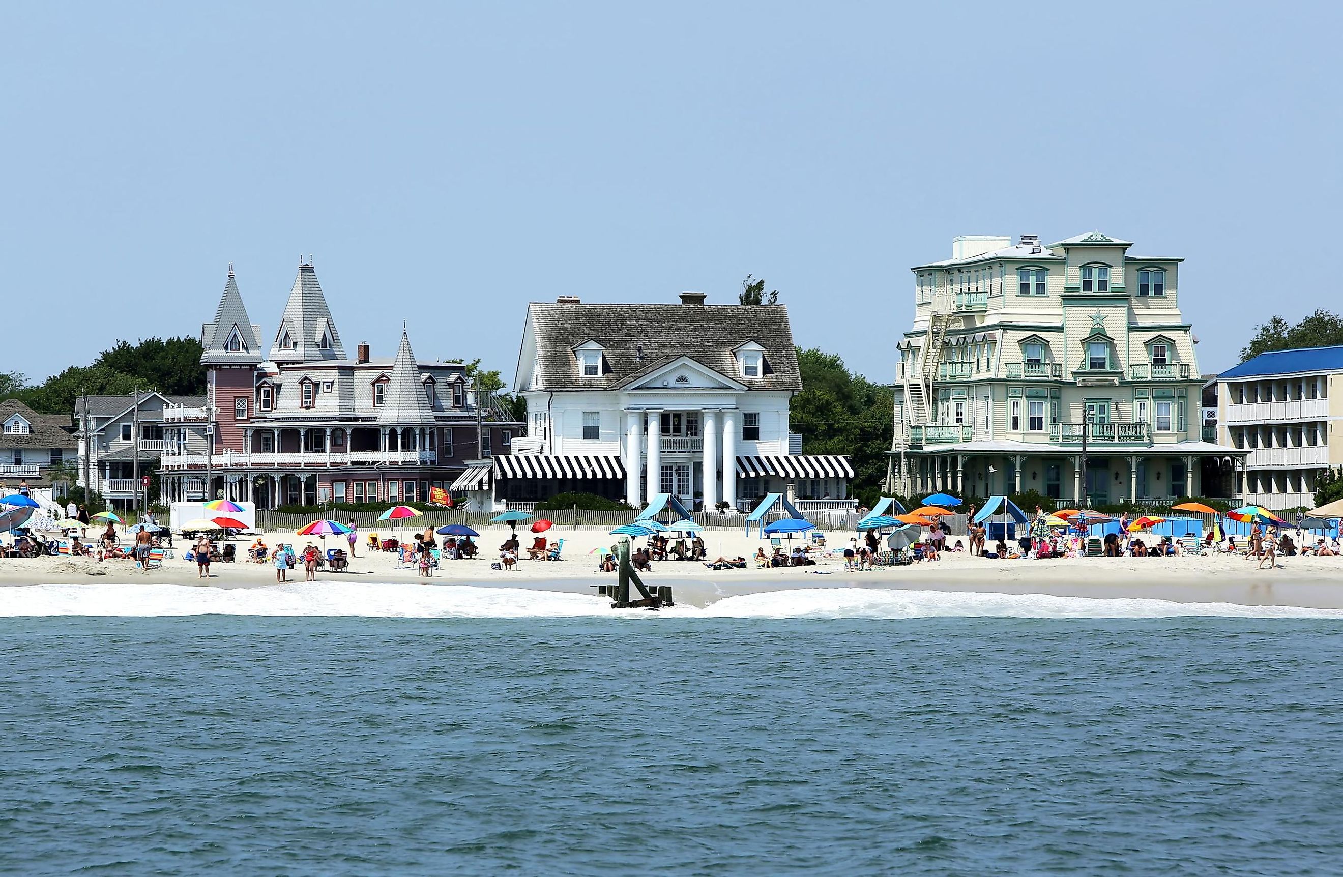 Beachgoers enjoy a beautiful day in Cape May, New Jersey. Image credit Racheal Grazias via Shutterstock.com