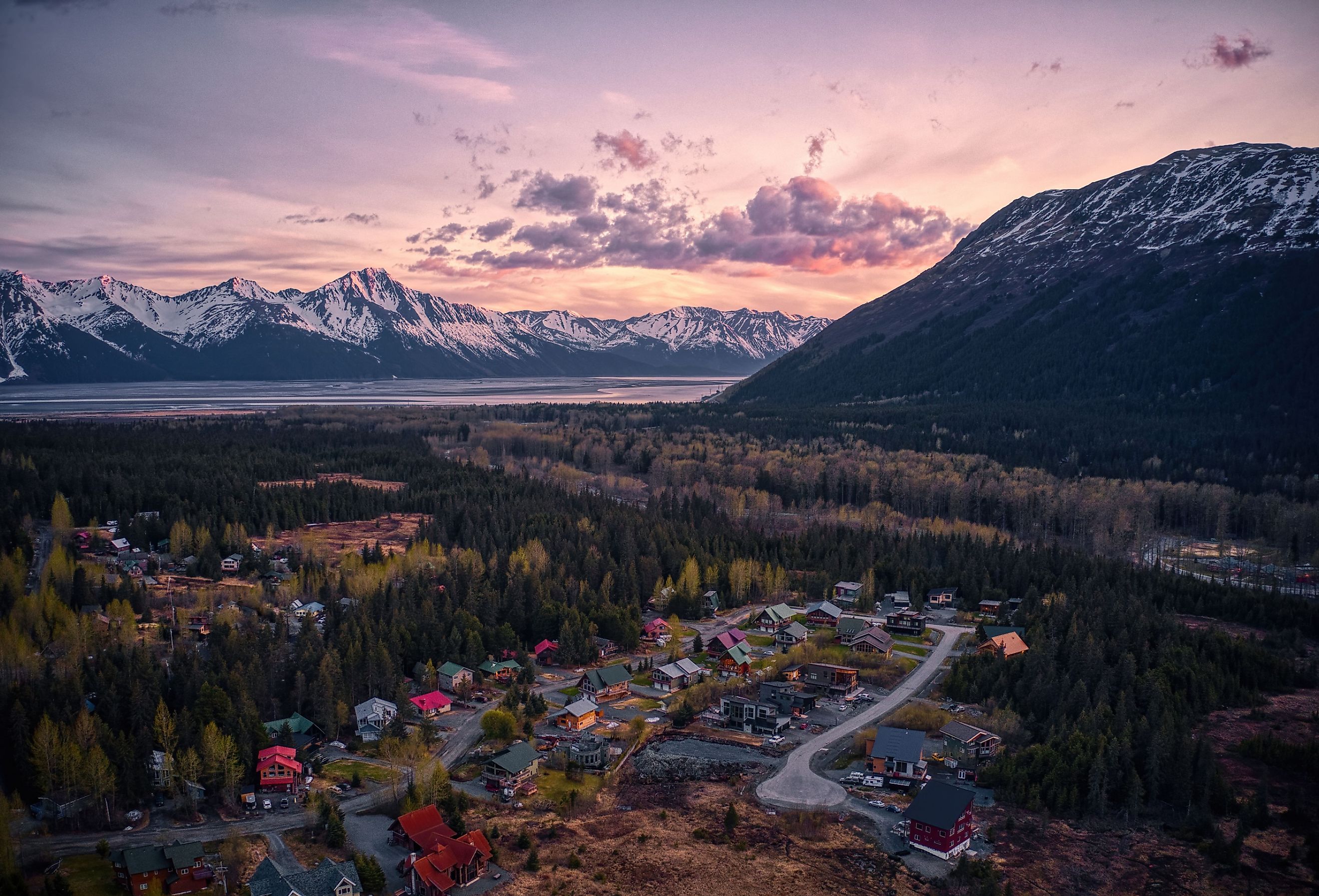 Aerial view of the resort town of Girdwood, Alaska, at sunset.