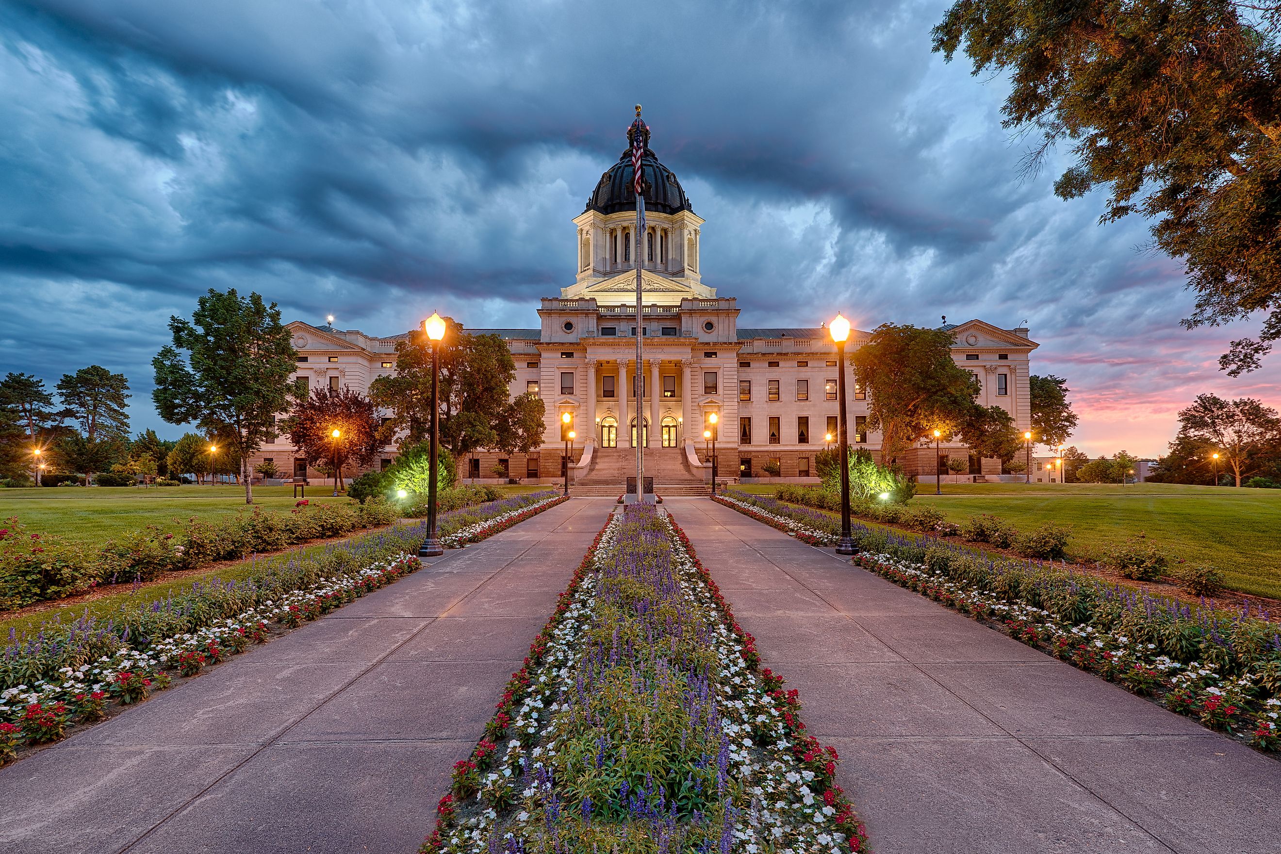 Storm clouds rolling in at dawn over the South Dakota State Capitol building in Pierre, South Dakota.