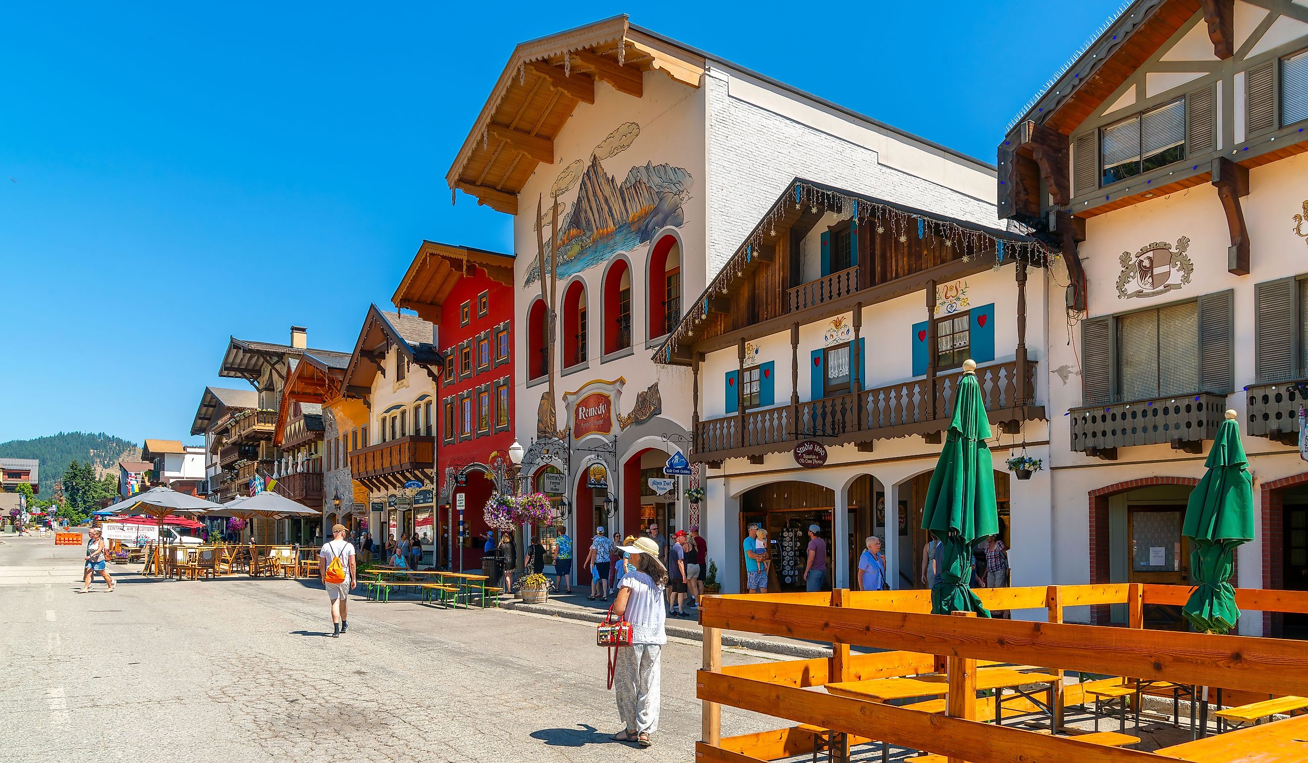 Shops and sidewalk cafes line the quaint Bavarian themed main street of the tourist resort town of Leavenworth, in the mountains of Central Washington State. Editorial credit: Kirk Fisher / Shutterstock.com