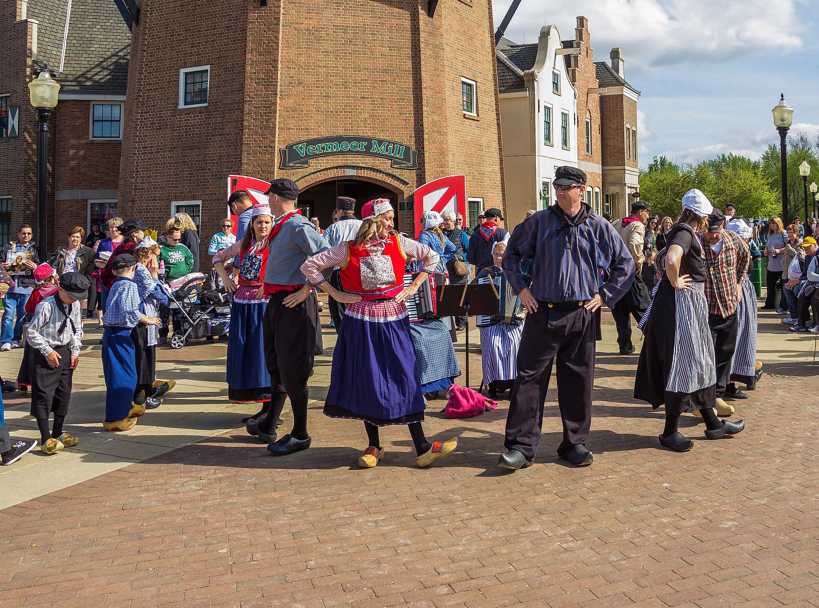 Folk dance in traditional Dutch costume during the Tulip Time Festival in Pella, Iowa, USA. Editorial credit: yosmoes815 / Shutterstock.com