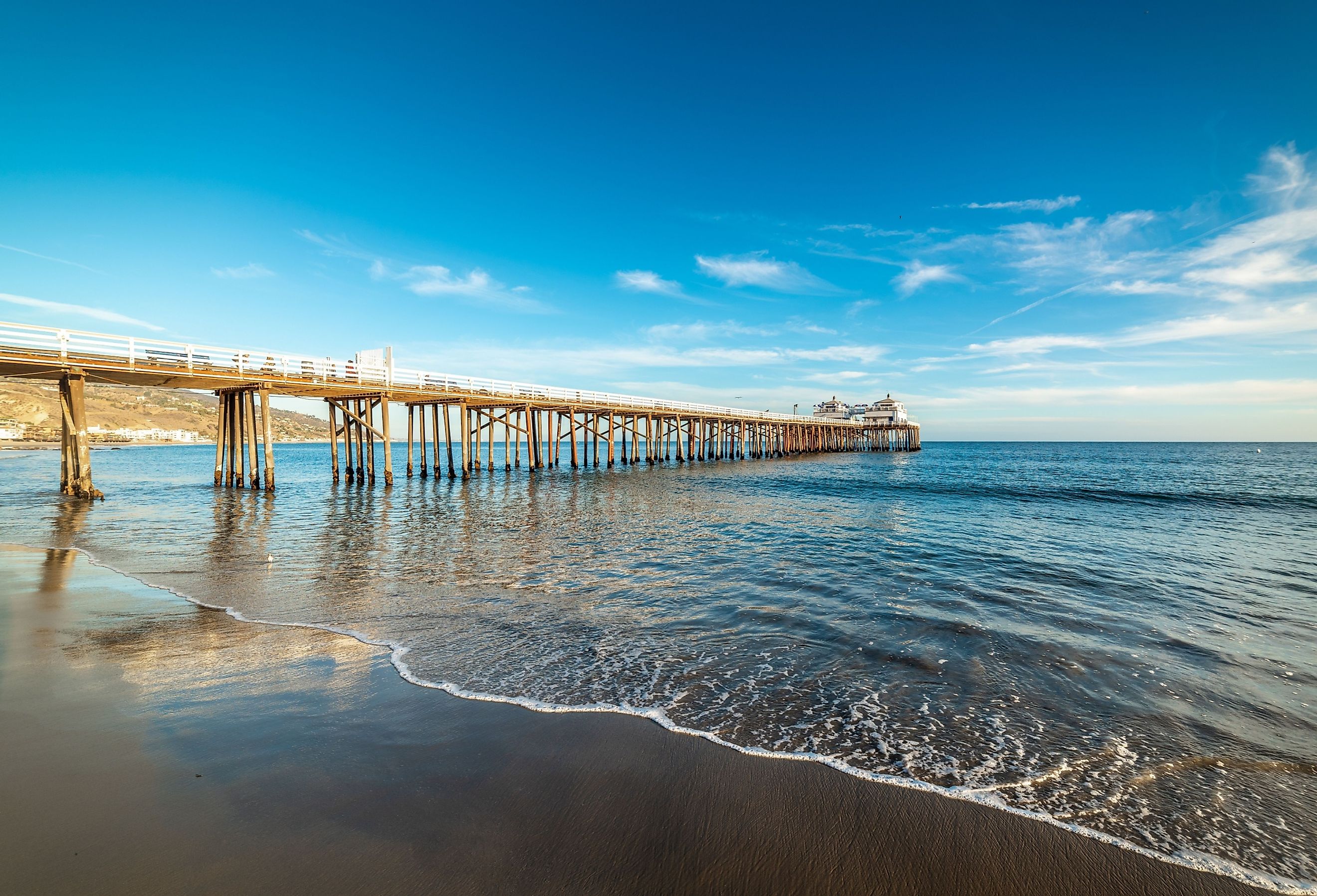 Malibu pier under a blue sky at sunset. California, USA